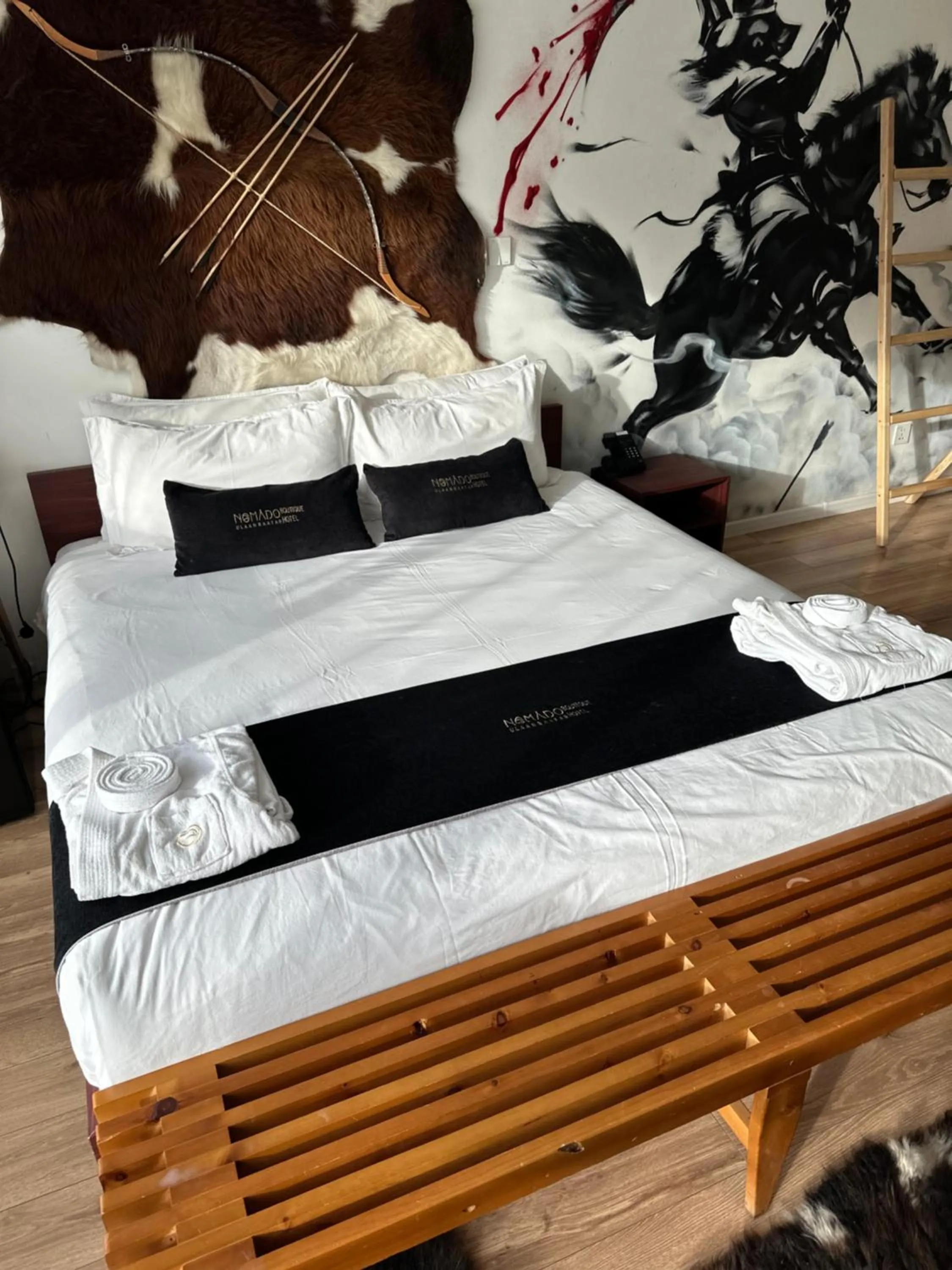 Bed in Nomado Boutique Hotel