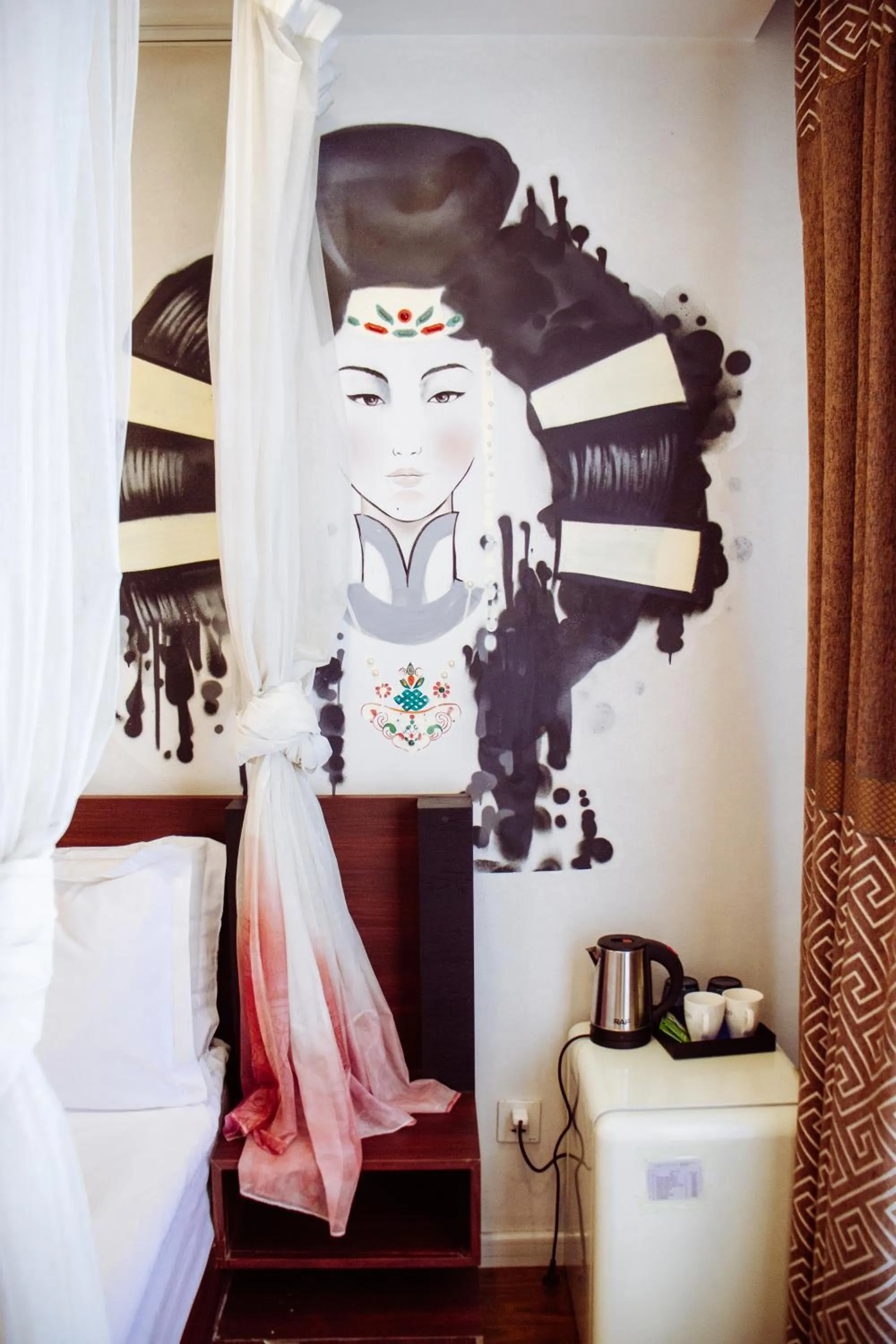 Bed in Nomado Boutique Hotel