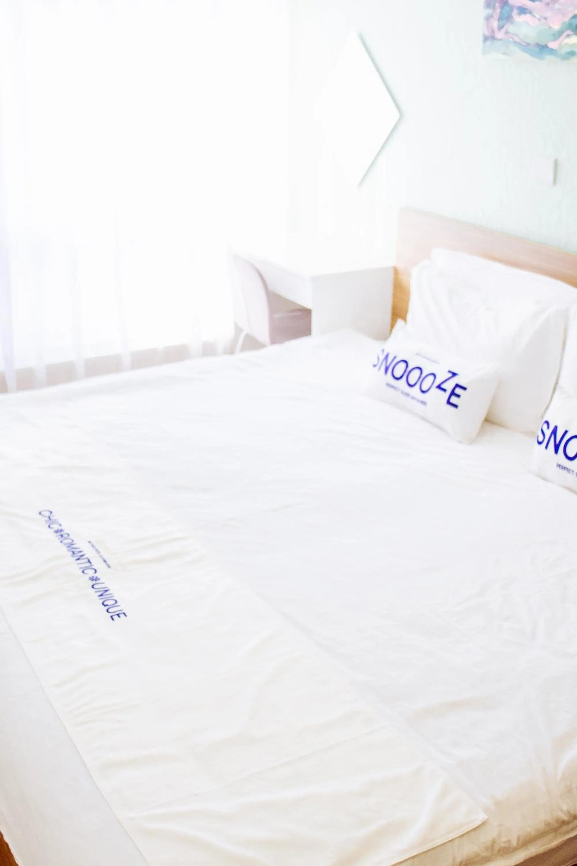 Bed in Nomado Boutique Hotel