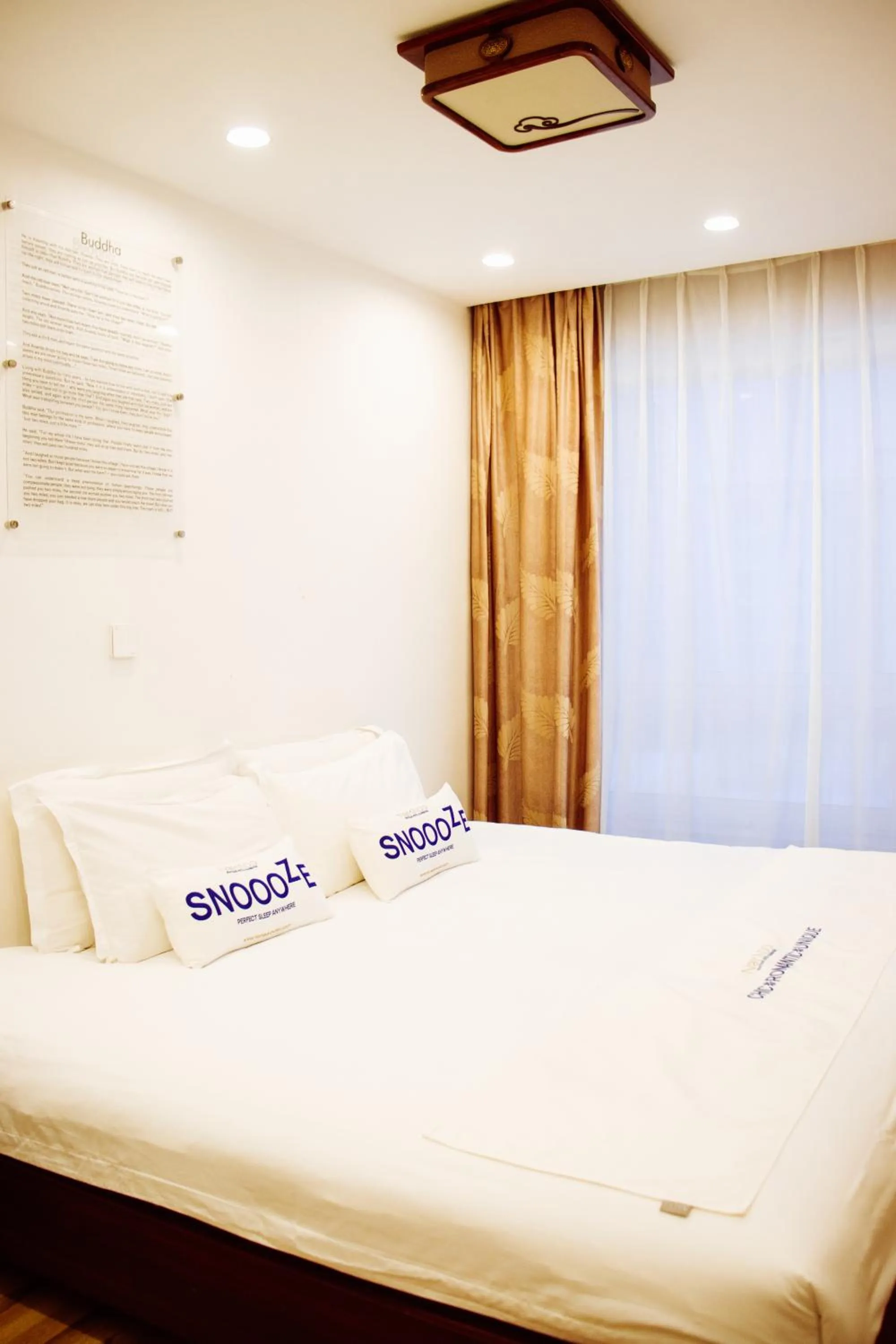 Bed in Nomado Boutique Hotel