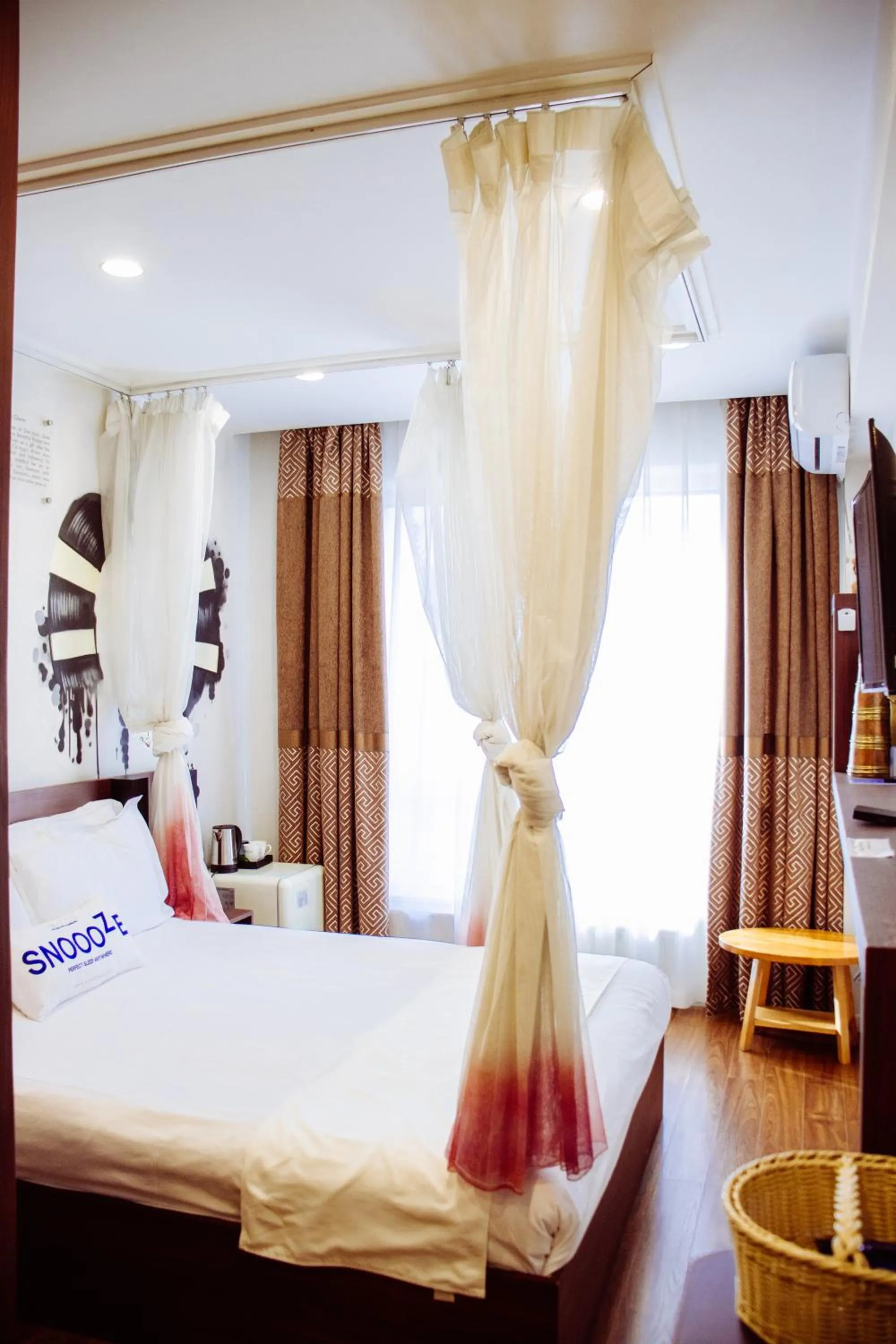 Bed in Nomado Boutique Hotel