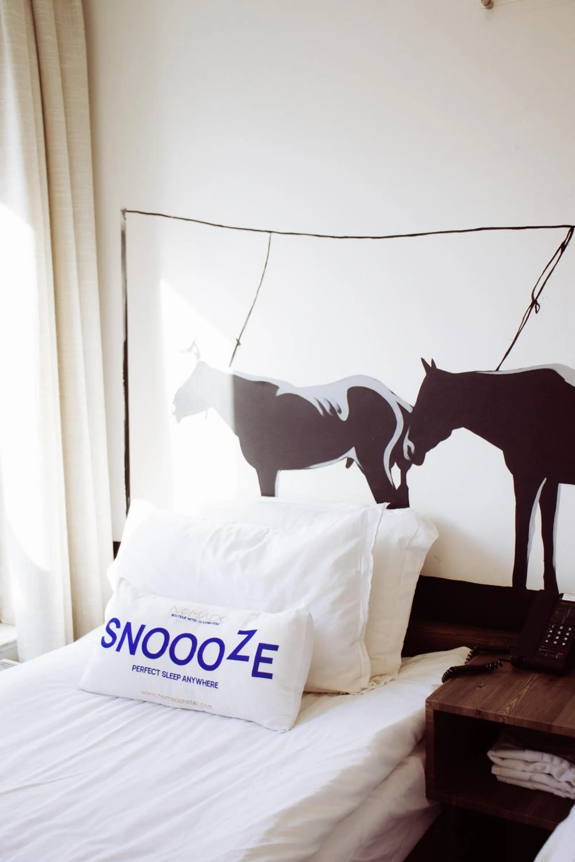 Bed in Nomado Boutique Hotel