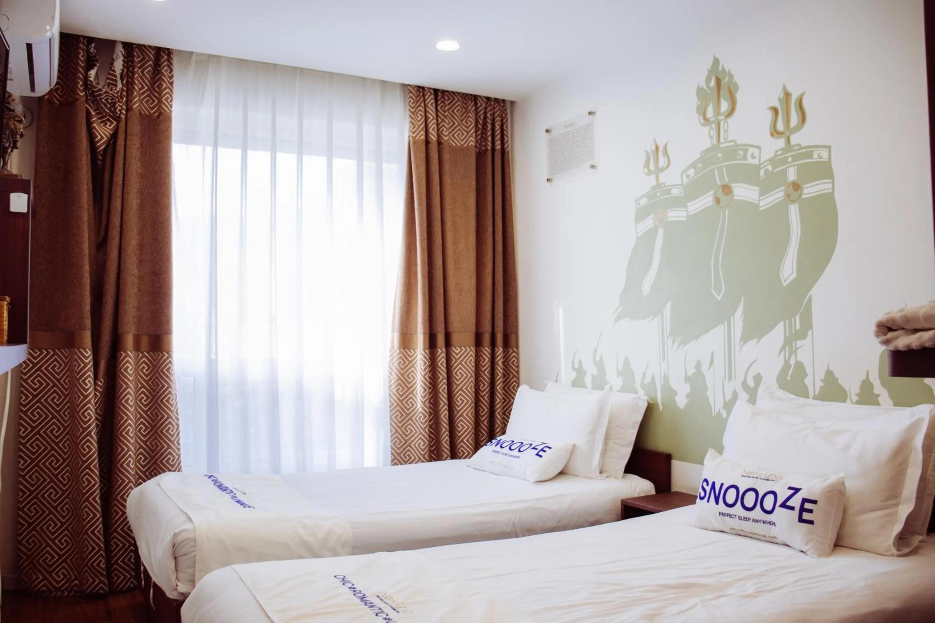 Bed in Nomado Boutique Hotel