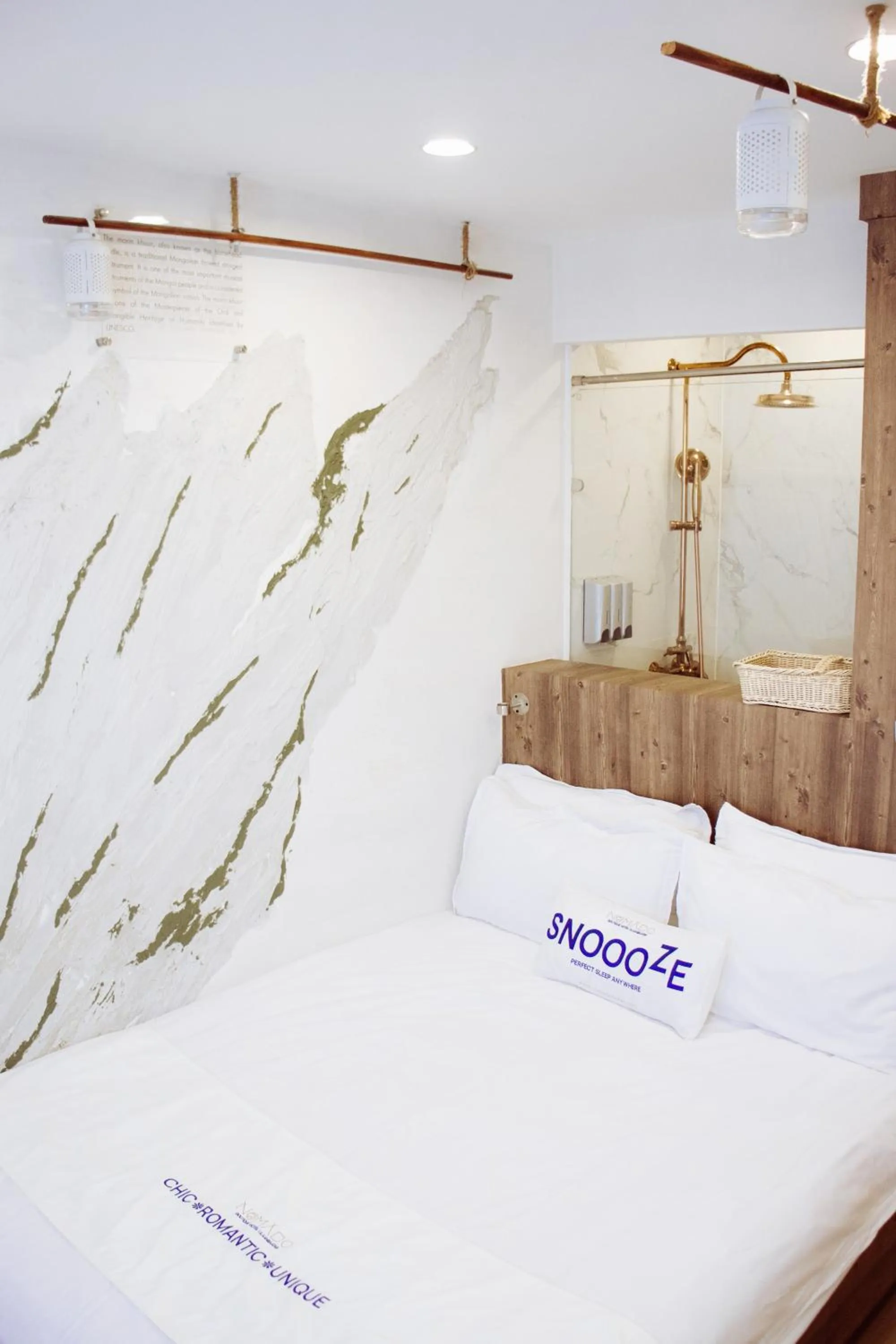 Bed in Nomado Boutique Hotel