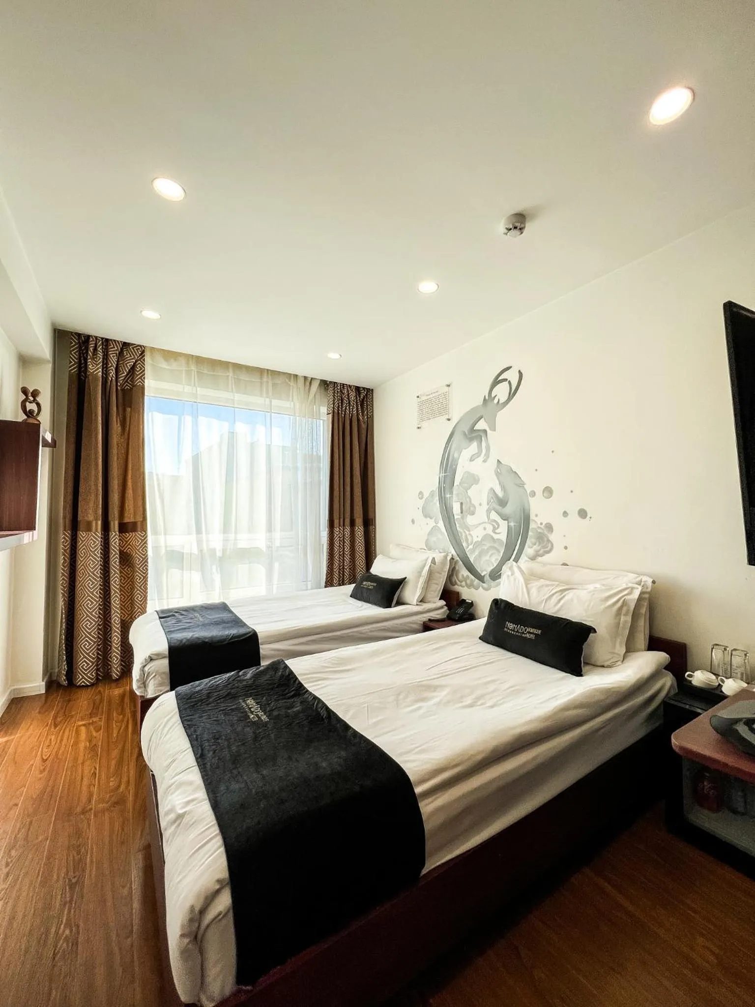 Bed in Nomado Boutique Hotel