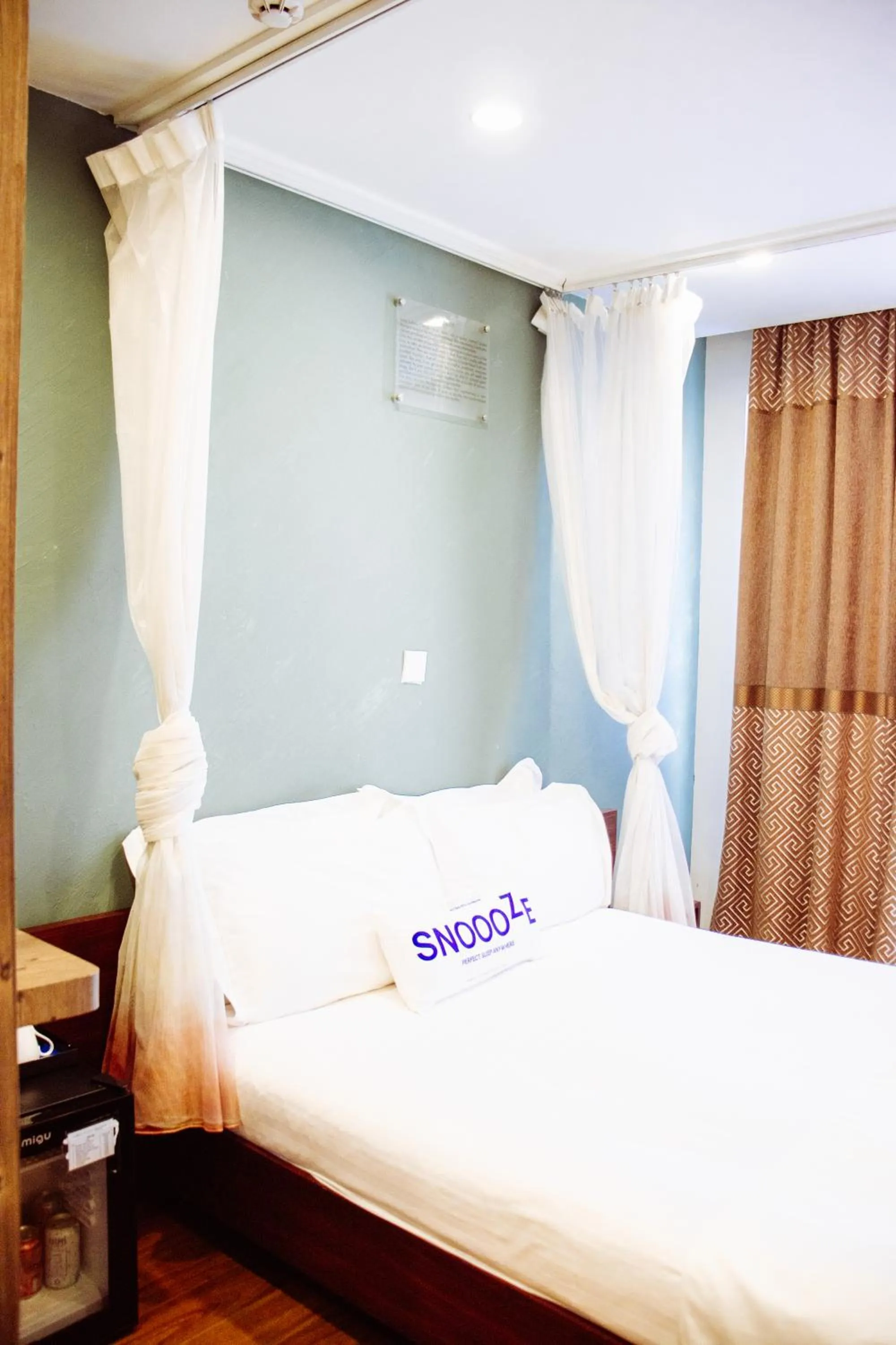 Bed in Nomado Boutique Hotel