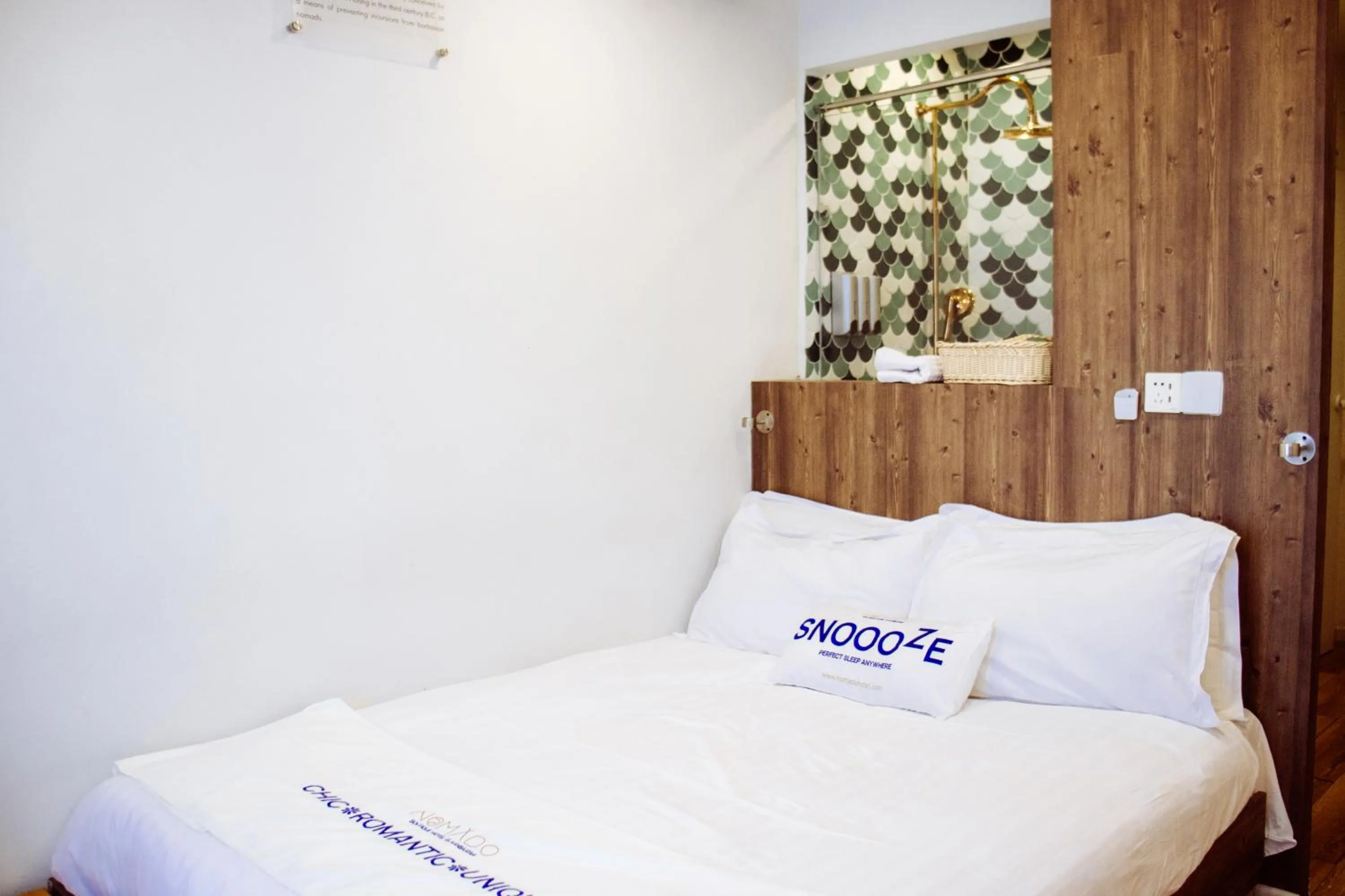 Bed in Nomado Boutique Hotel