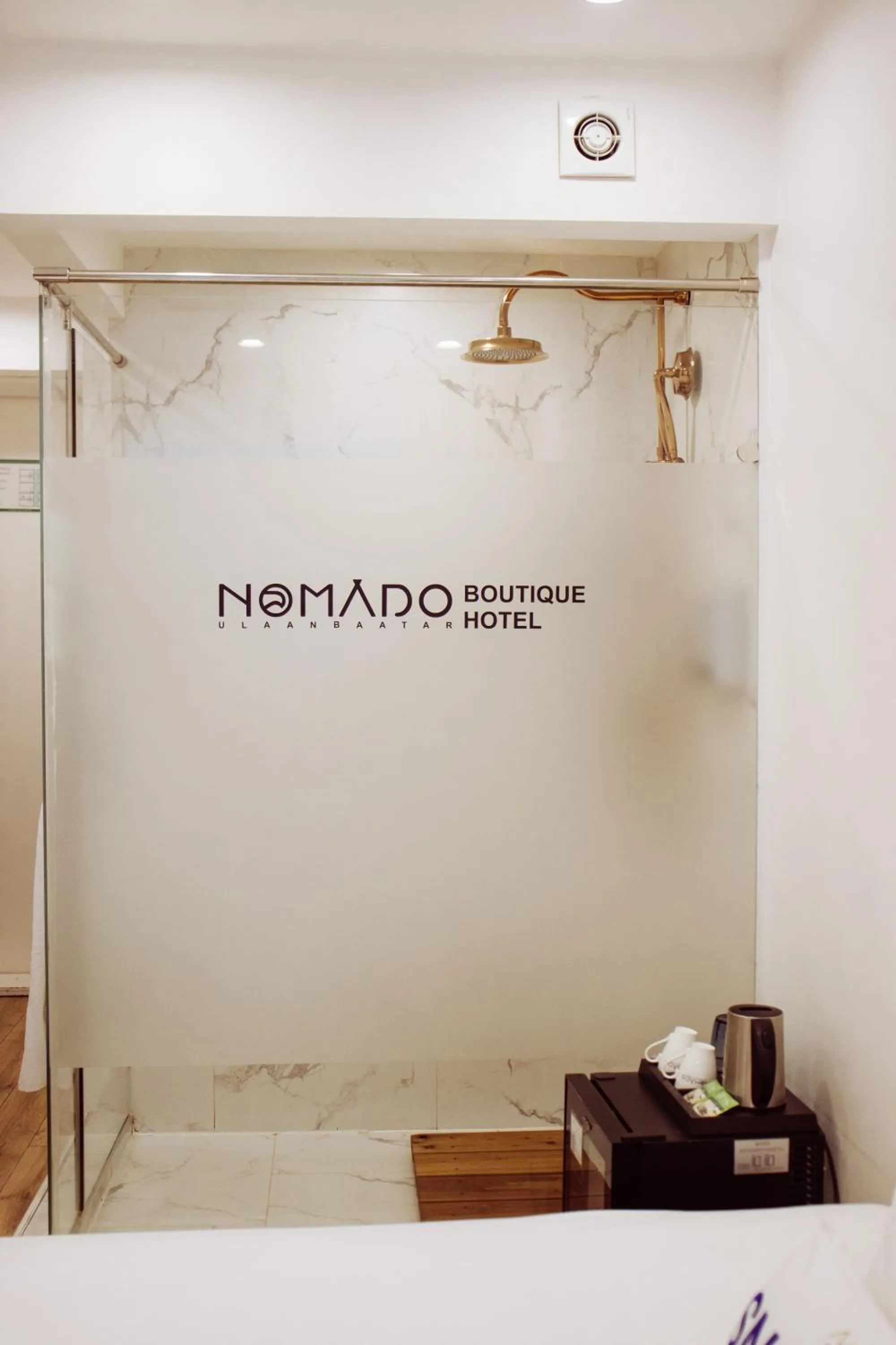 Shower in Nomado Boutique Hotel