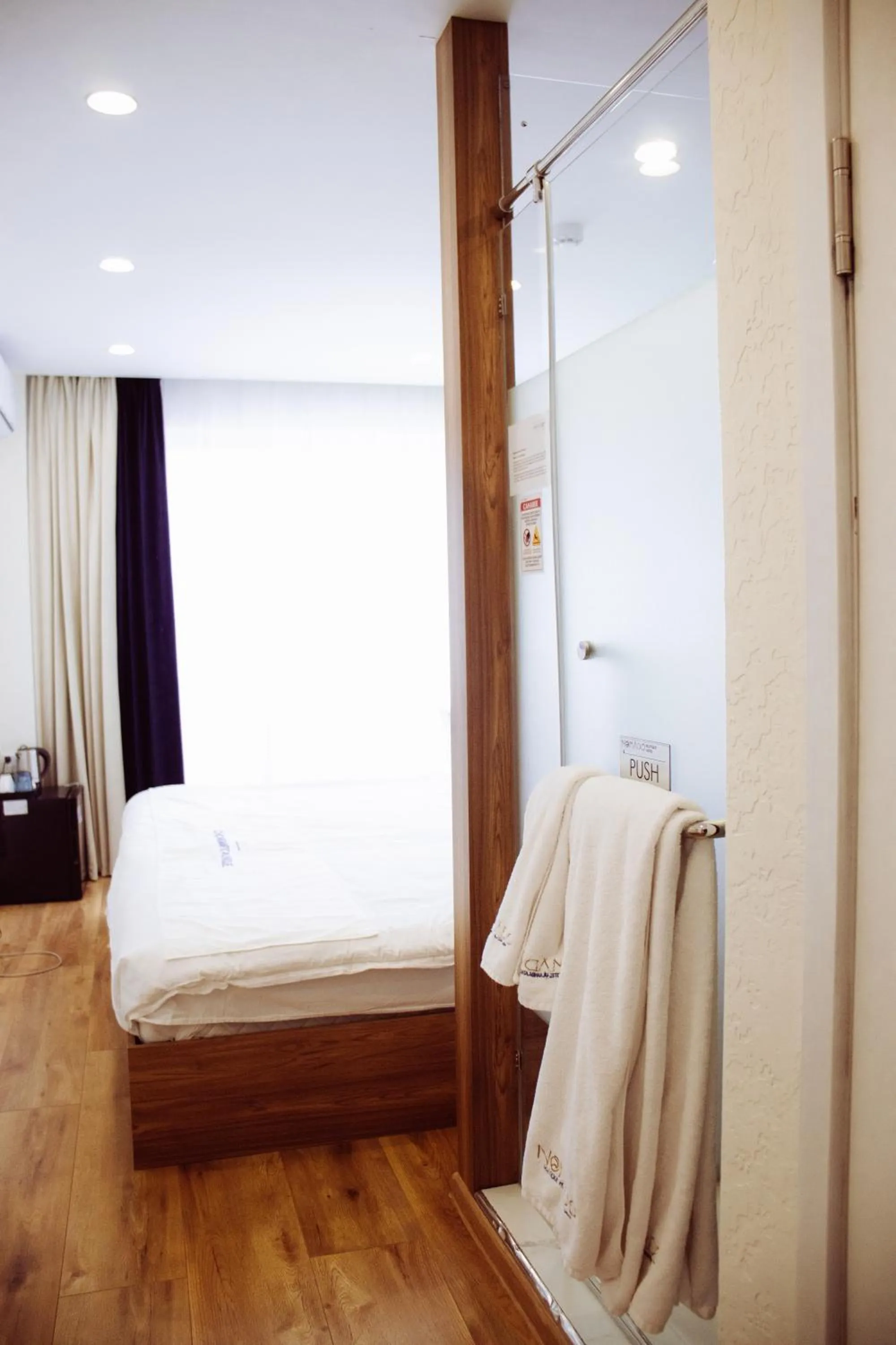 Bed in Nomado Boutique Hotel