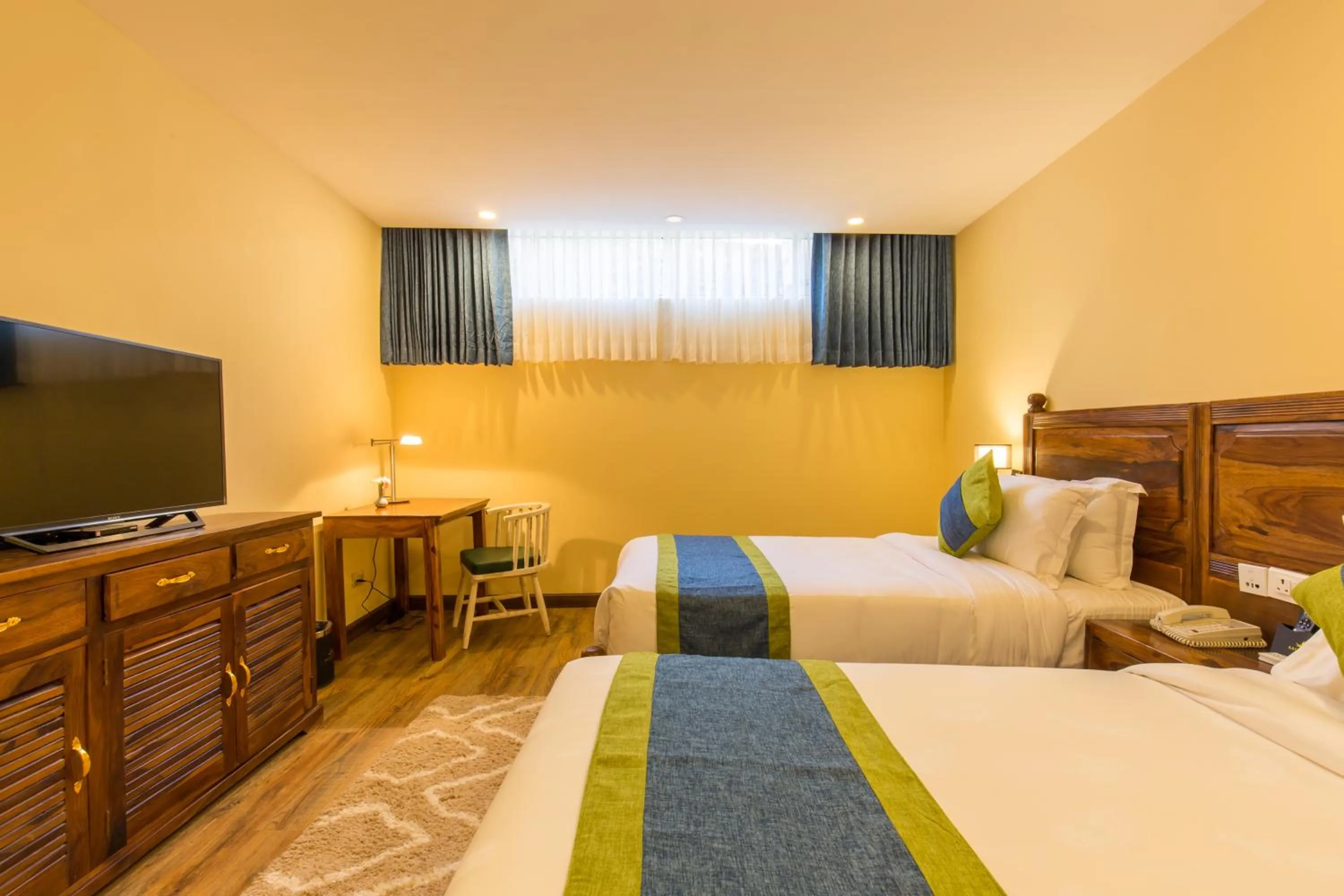 TV and multimedia, Bed in Aagantuk Resort