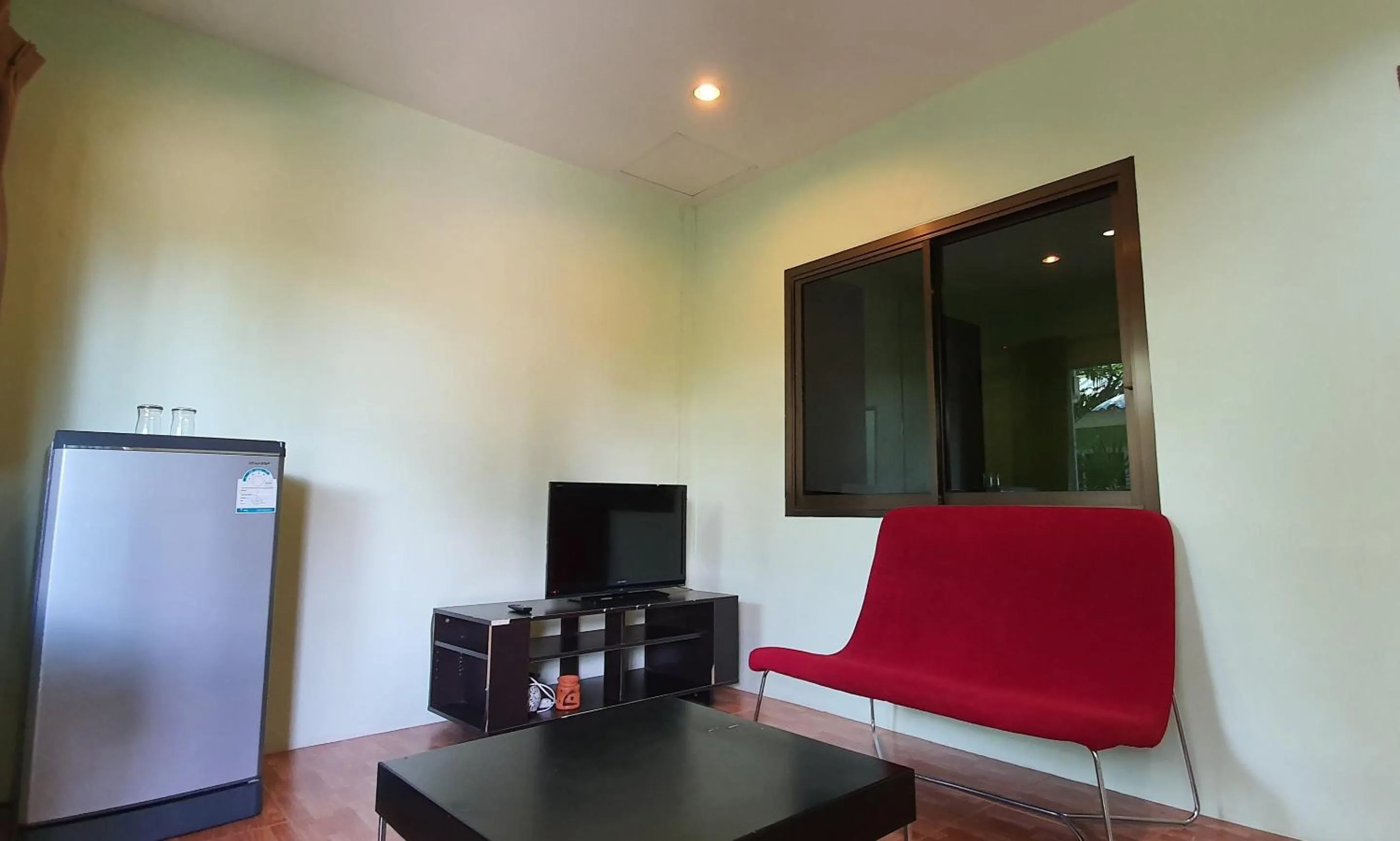 Seating area in Chalong Stay Well by Palai Seafood