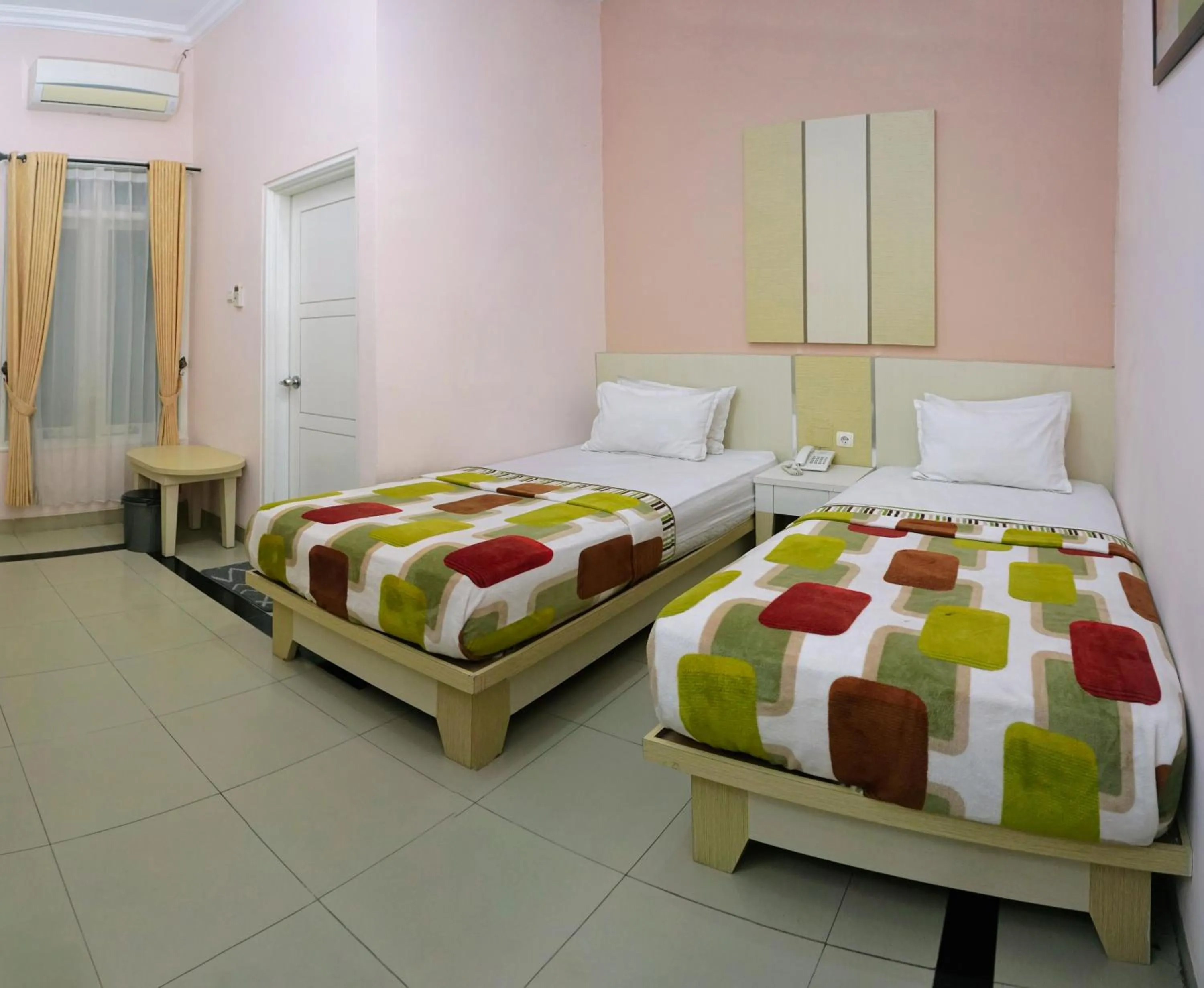 Bedroom in Musdalifah Hotel