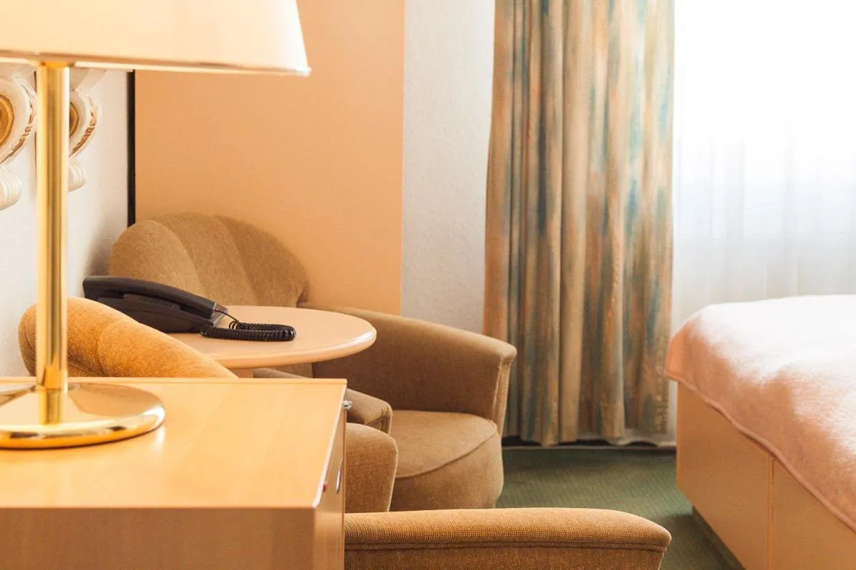 Seating area, Bed in Hotel Villa Auguste Viktoria