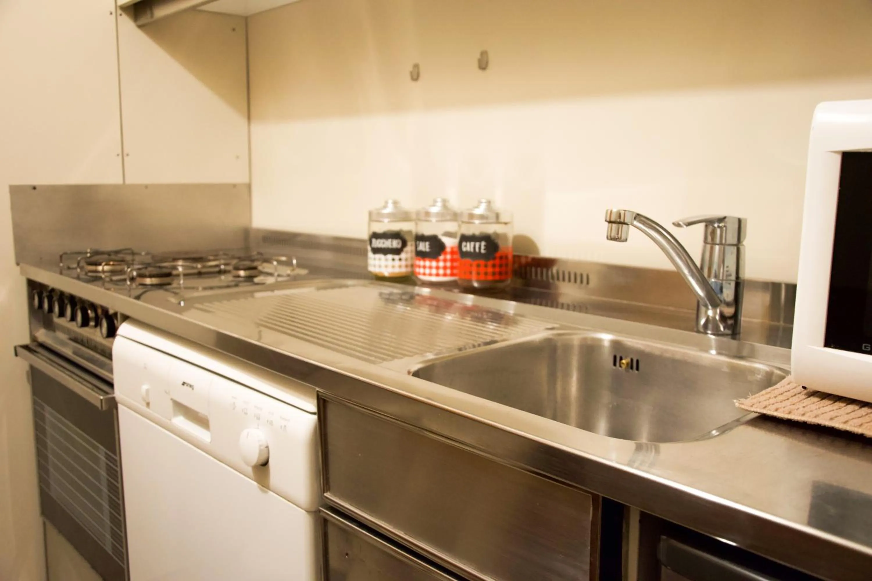 Kitchen or kitchenette in Anzolo Palace - Rooms & Apartments