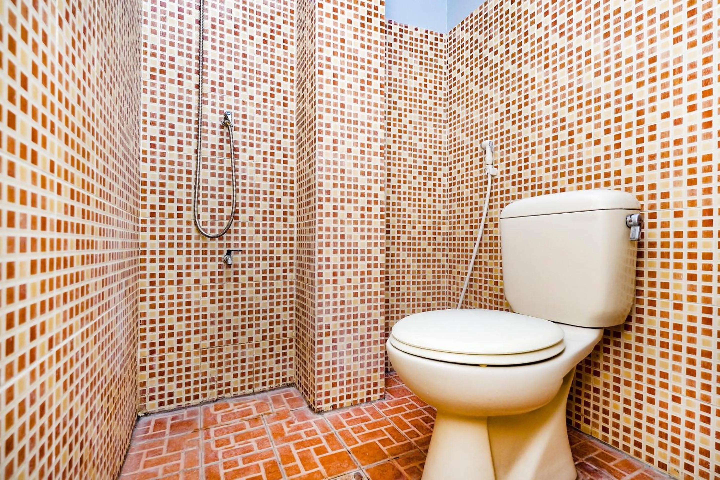 Bathroom in Hotel O Solo Point Guest House Syariah