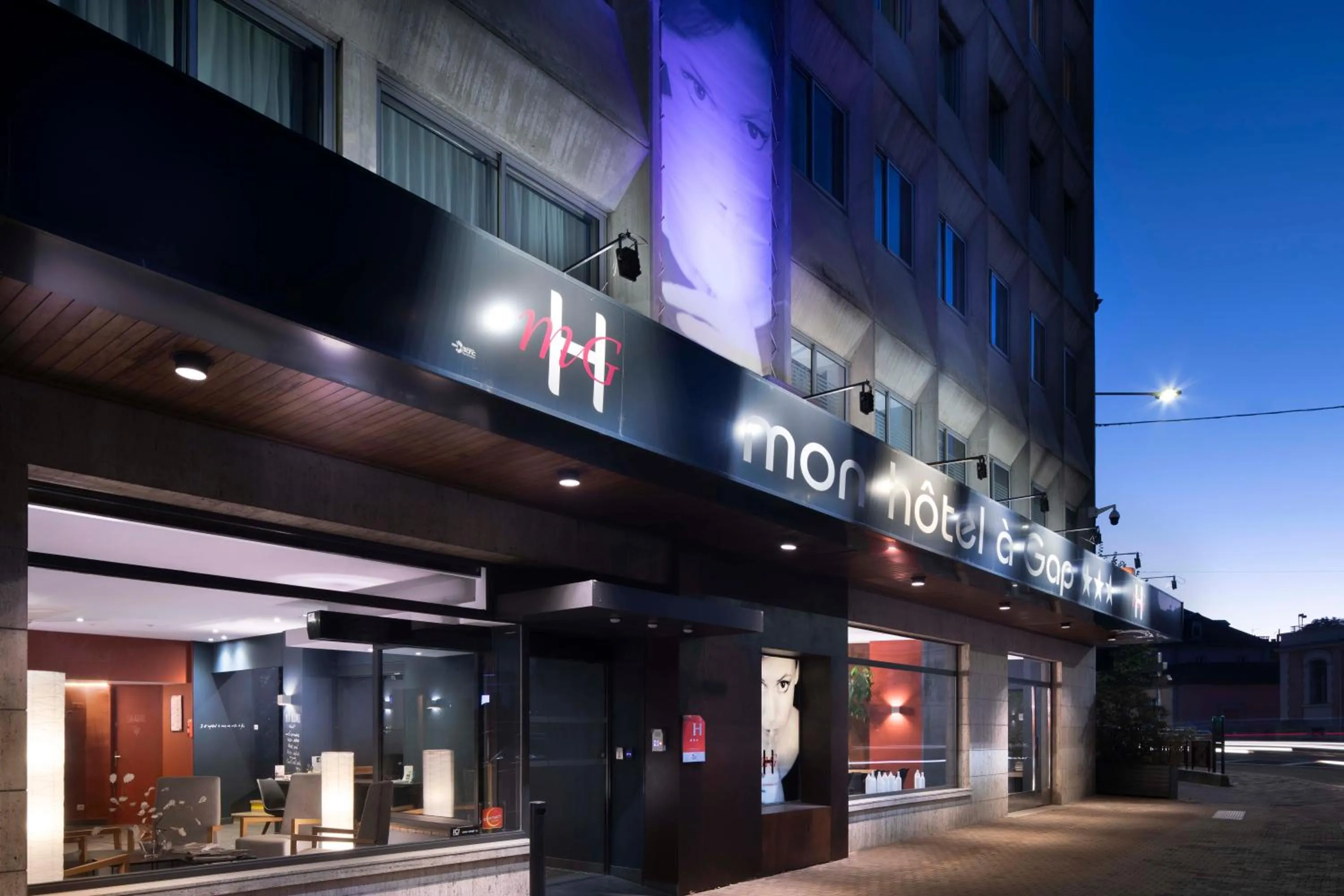 Property logo or sign in Mon Hotel à Gap