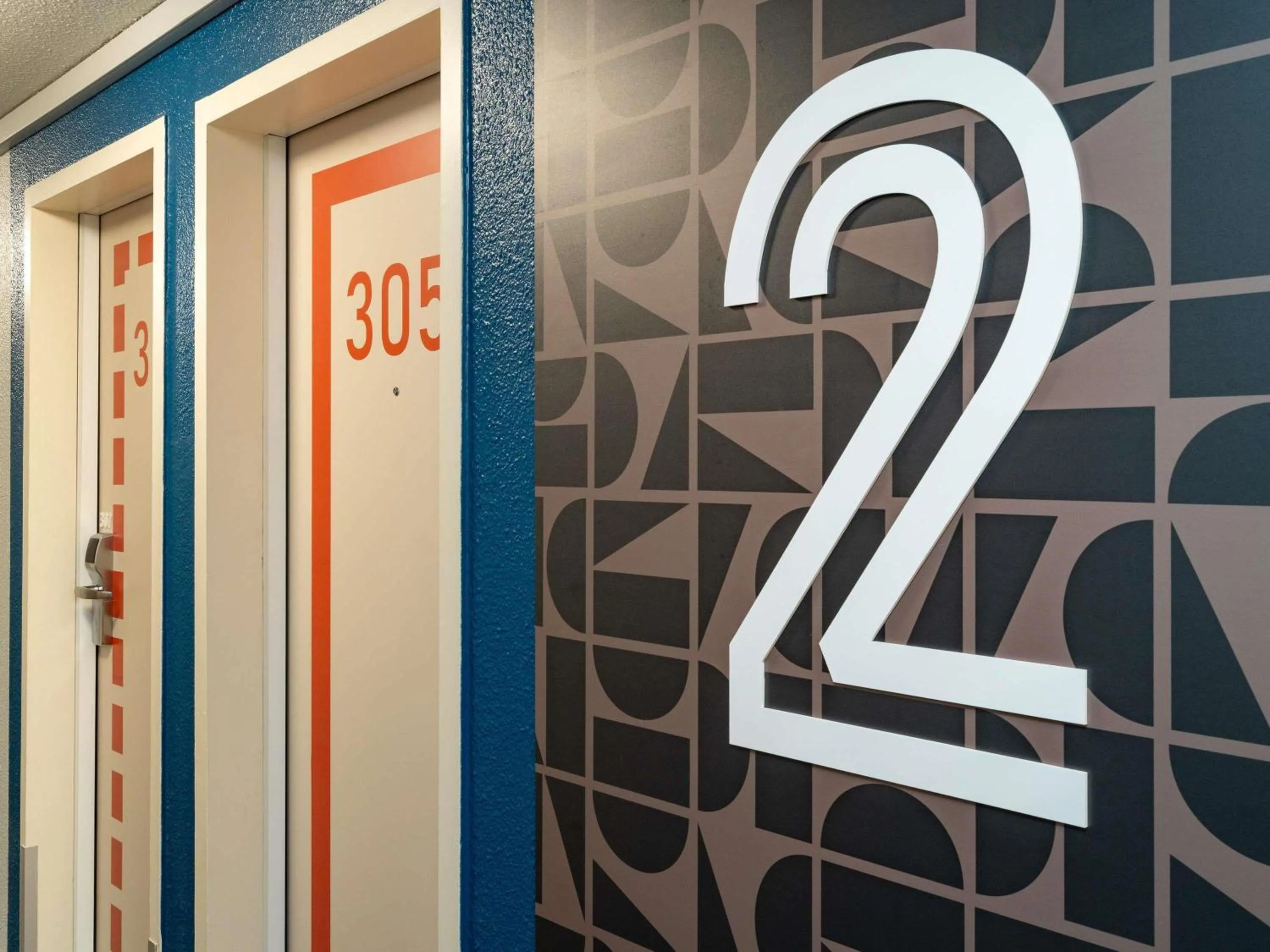 Bedroom in ibis budget Nantes Sainte Luce - Hôtel Rénové