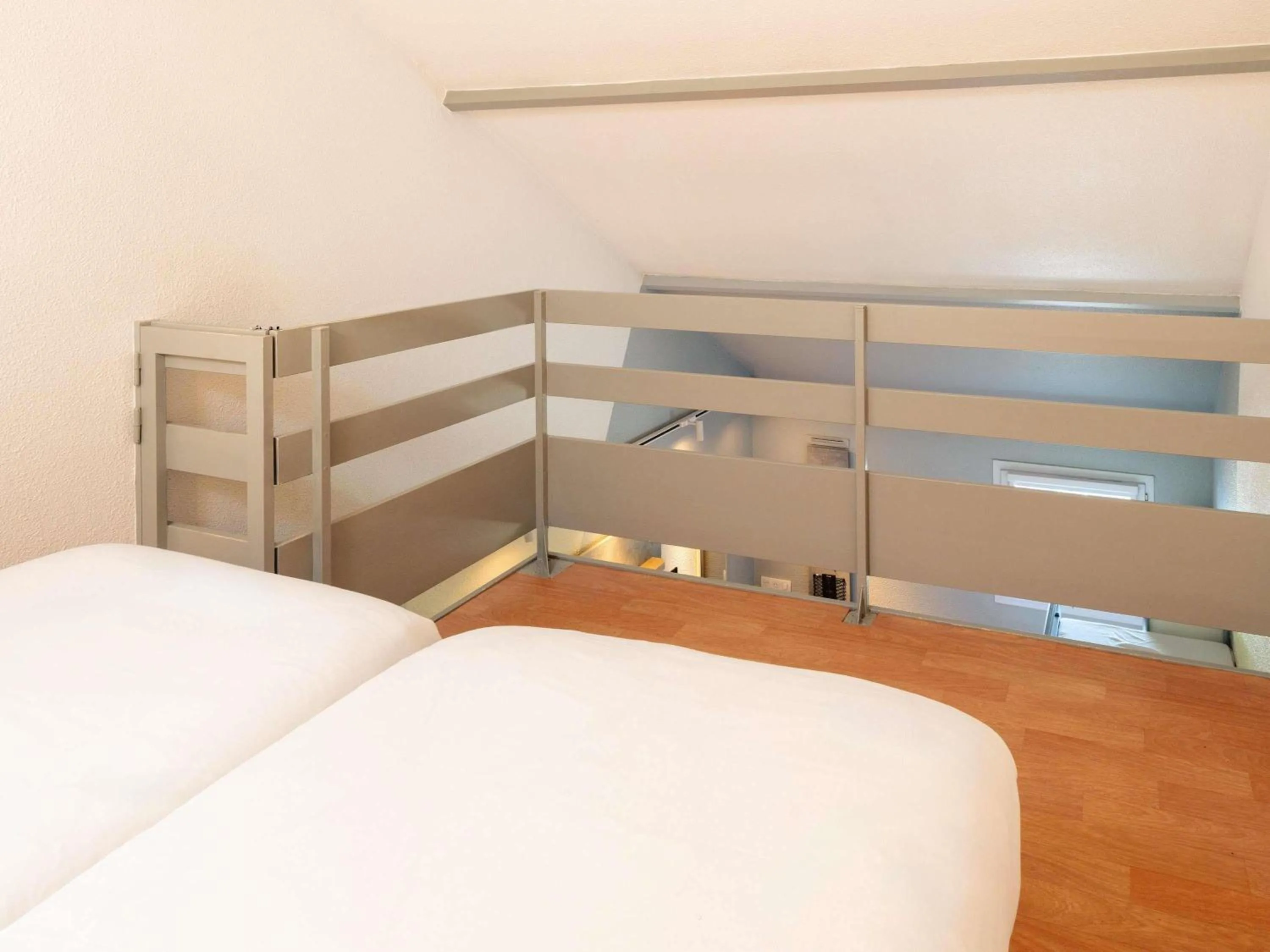 Bedroom, Bed in ibis budget Nantes Sainte Luce - Hôtel Rénové