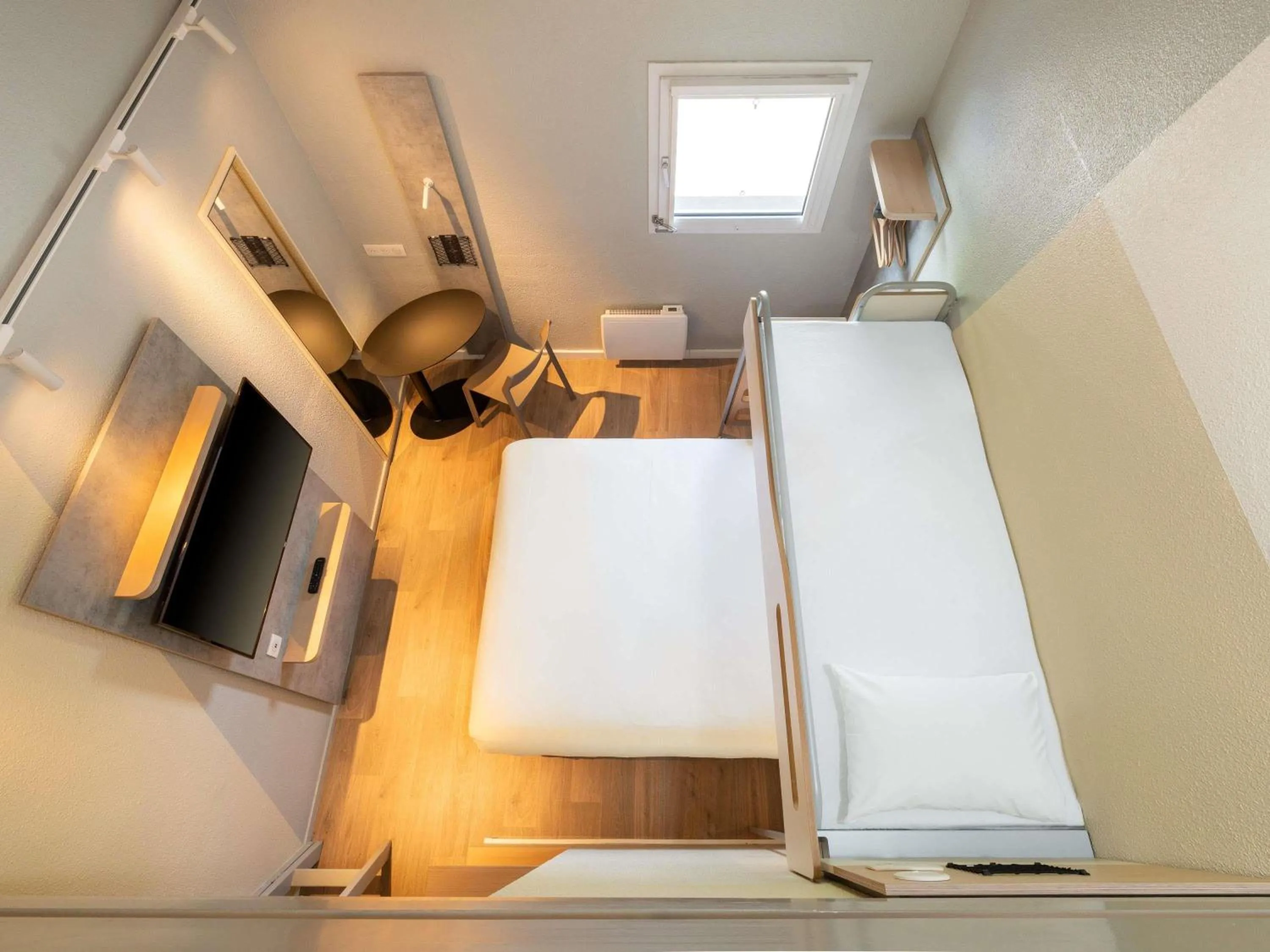 Bedroom, Bed in ibis budget Nantes Sainte Luce - Hôtel Rénové