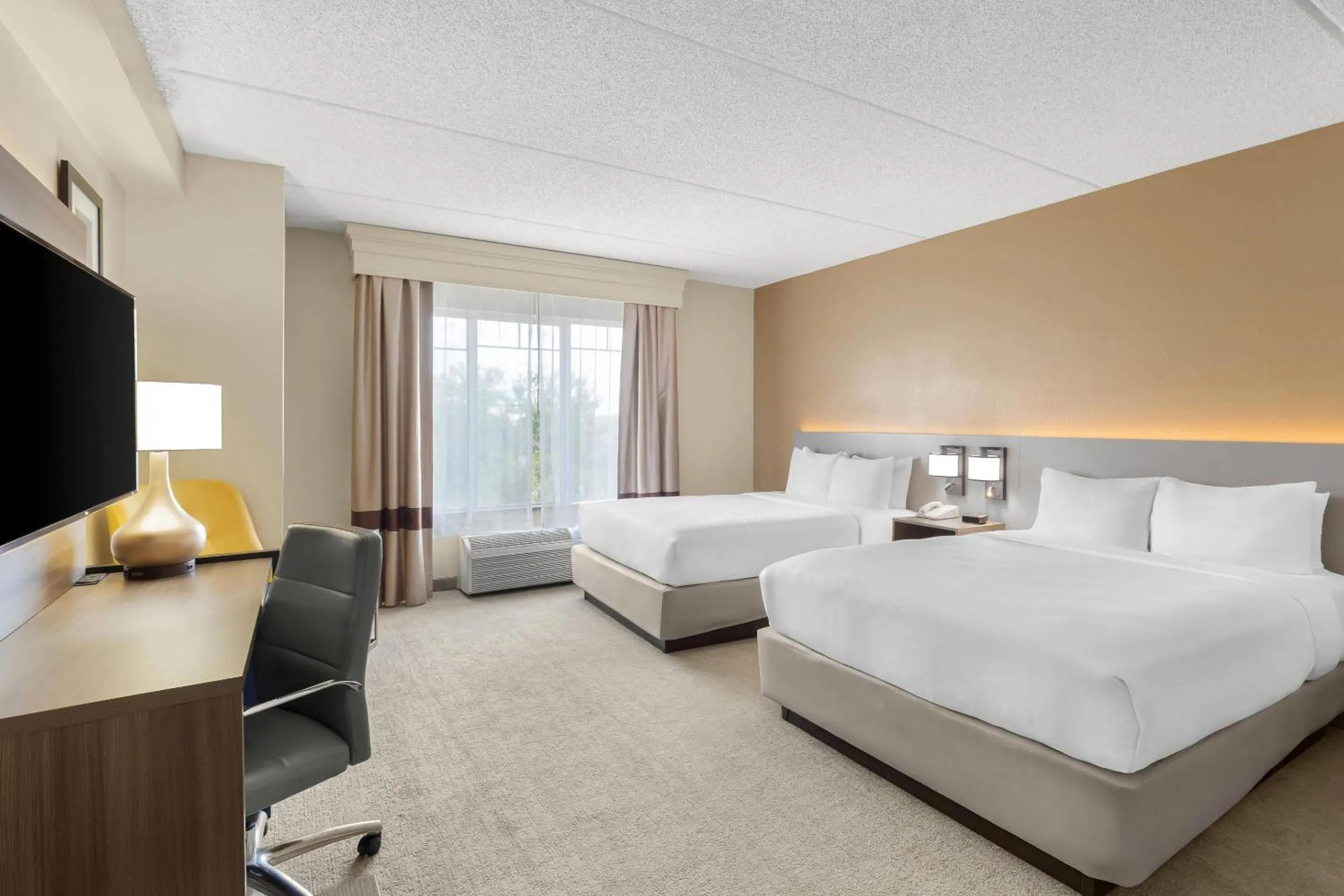 Bedroom, Bed in Comfort Suites Near Universal Orlando Resort
