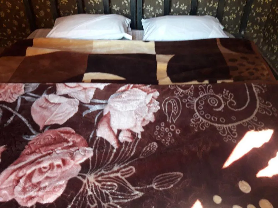 Bed in WadiRum Mobile Camp