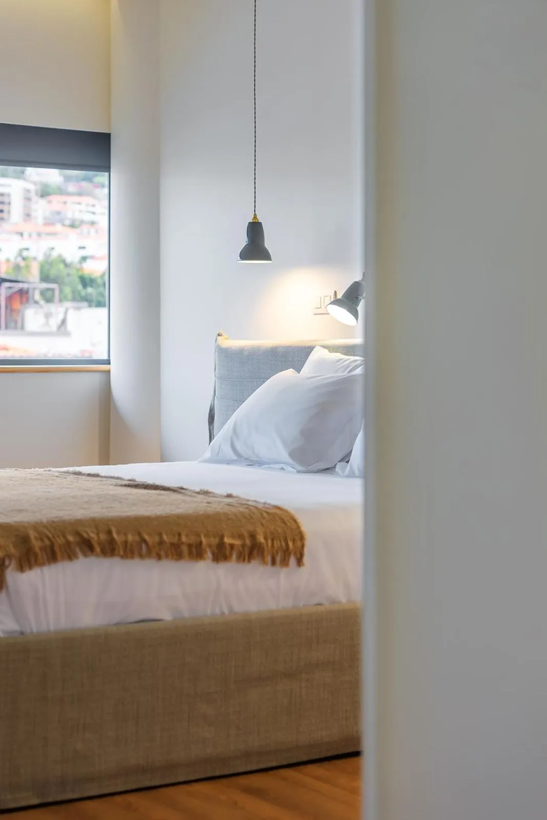 Bed in Three House Hotel