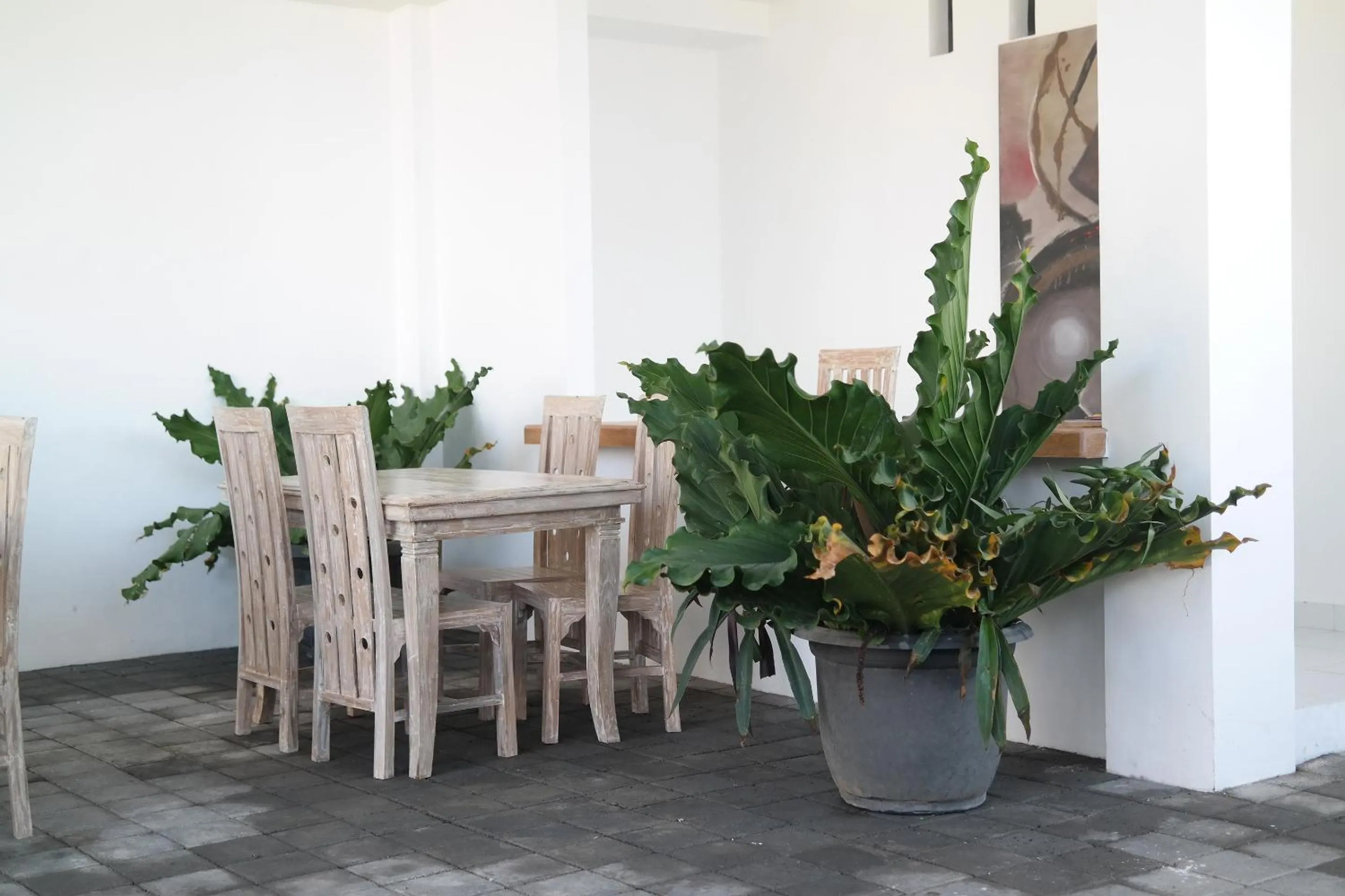 Dining area in Sau Bali Beach House Canggu