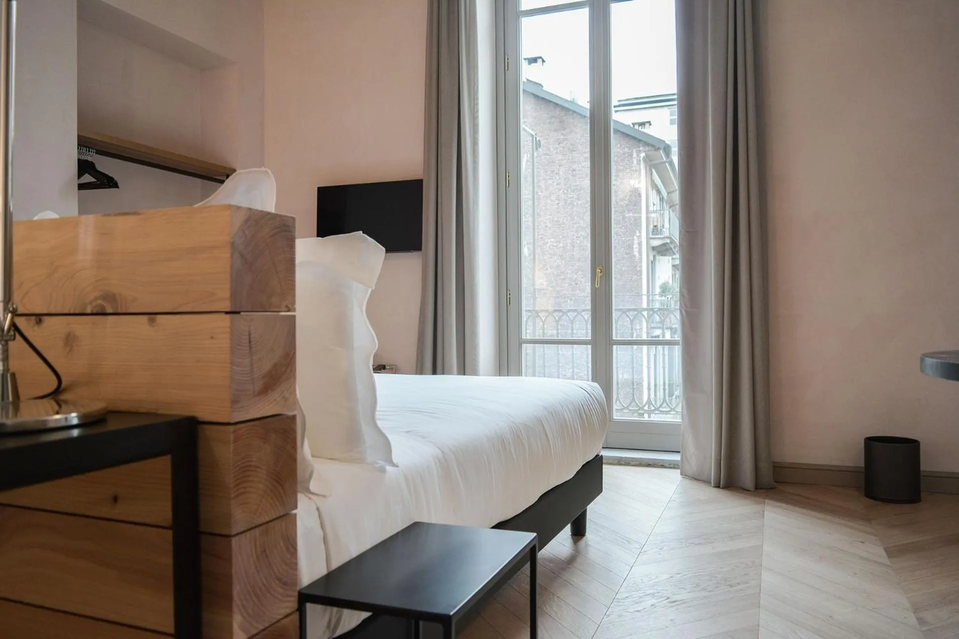 Bed in Opera35 Boutique Hotel