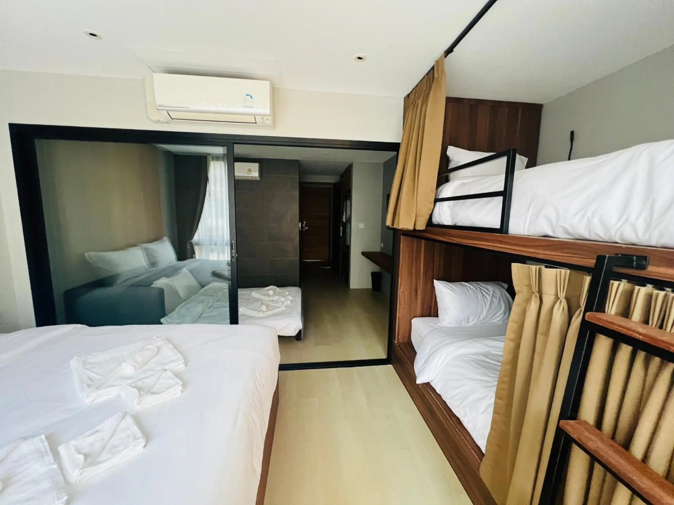 Bed in Woodstory Boutique Hotel