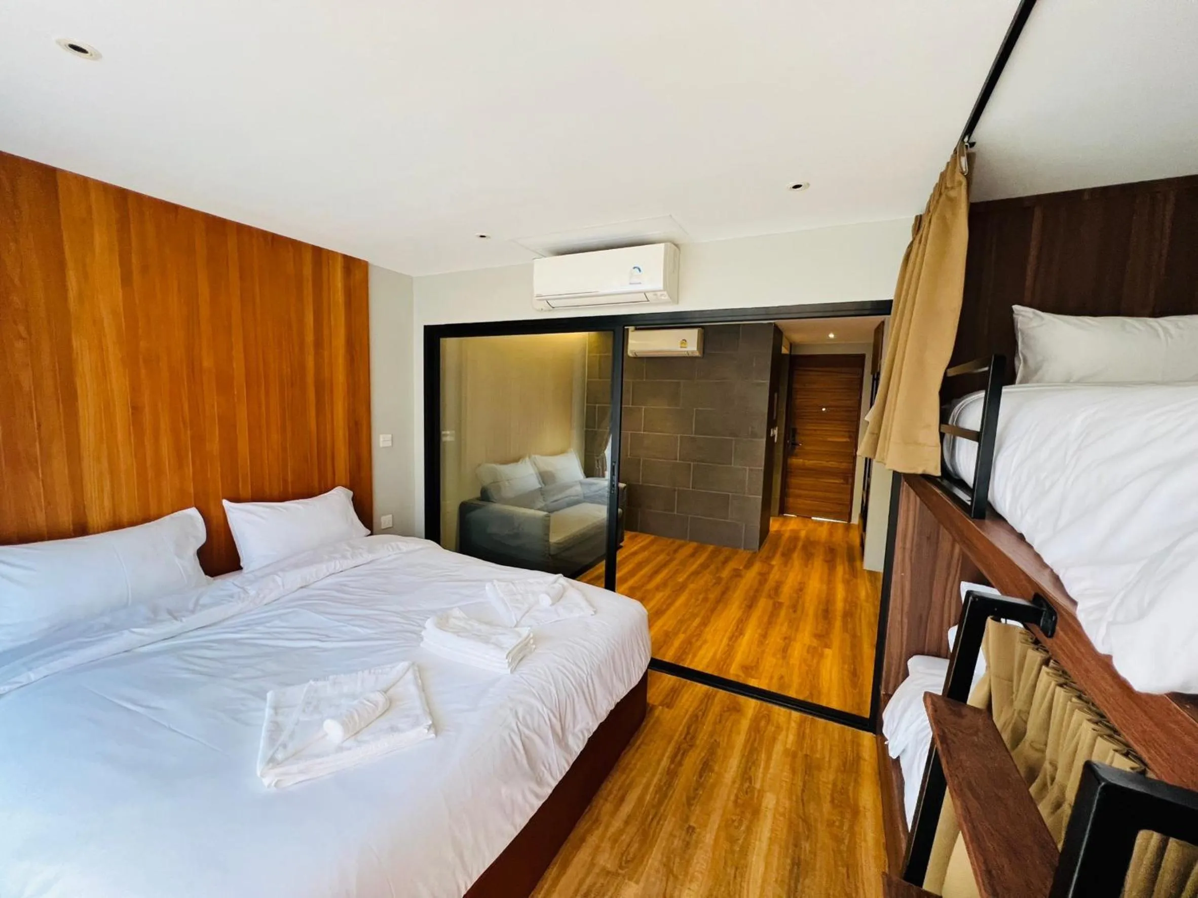 Bed in Woodstory Boutique Hotel