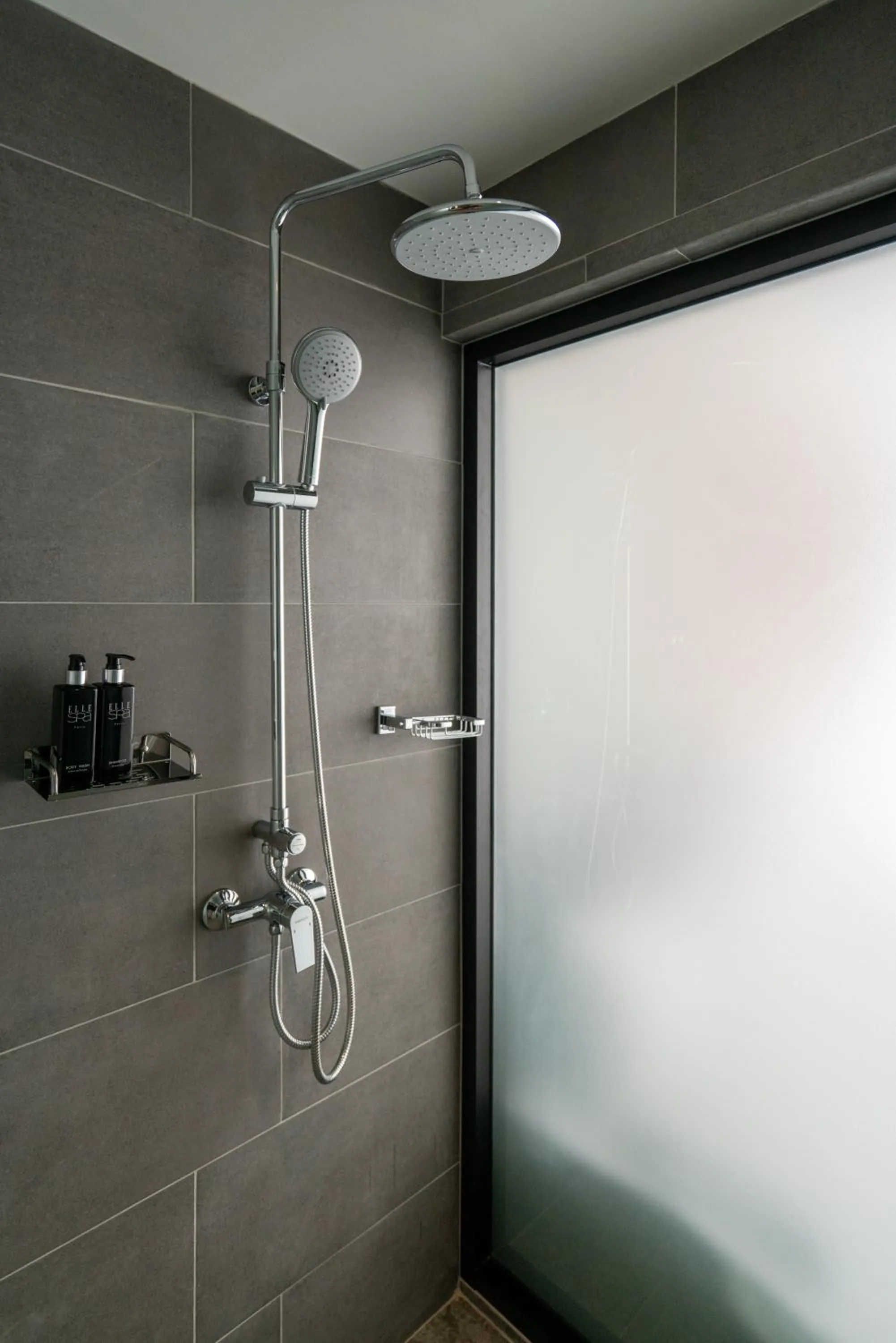 Shower in Woodstory Boutique Hotel