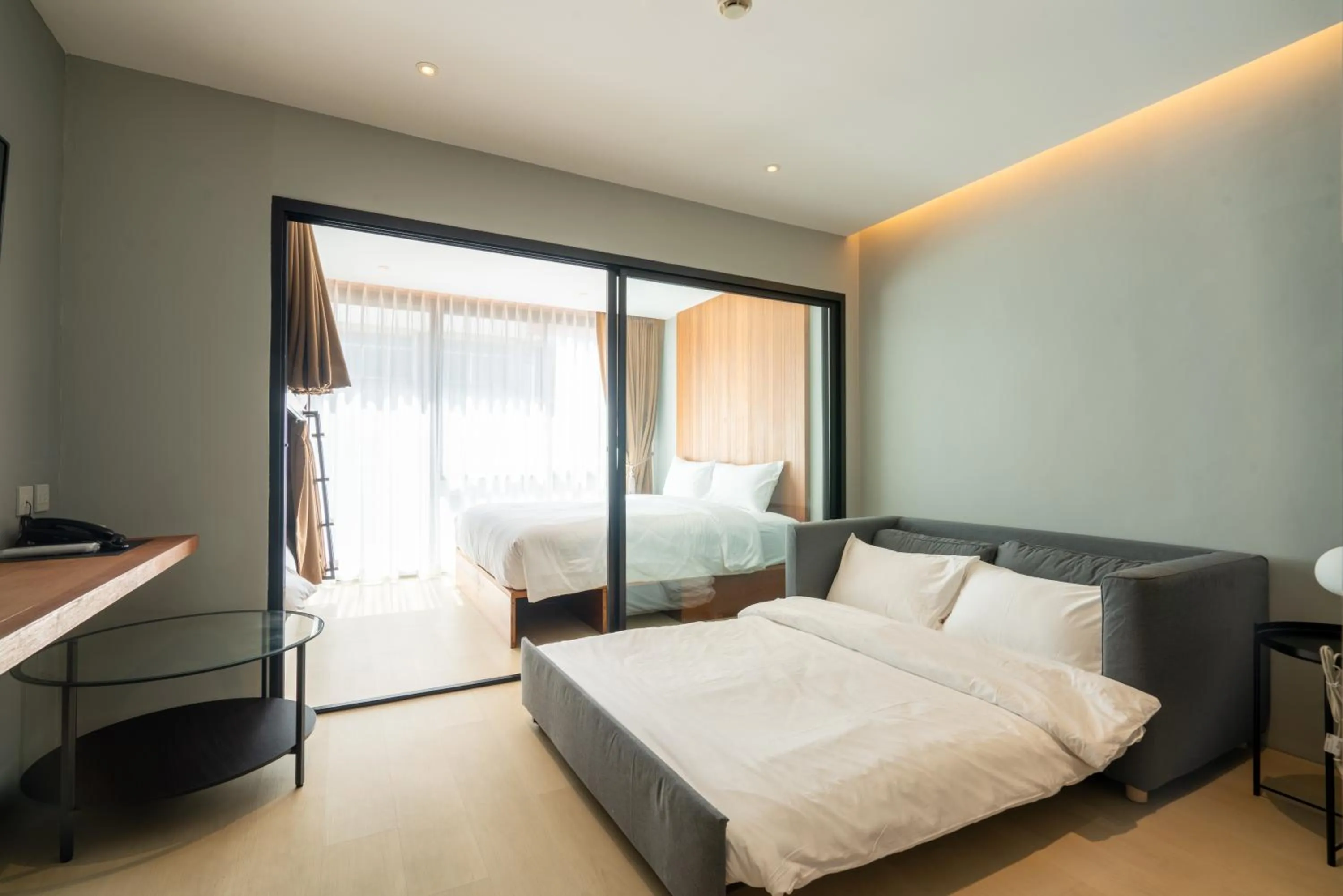 Bed in Woodstory Boutique Hotel