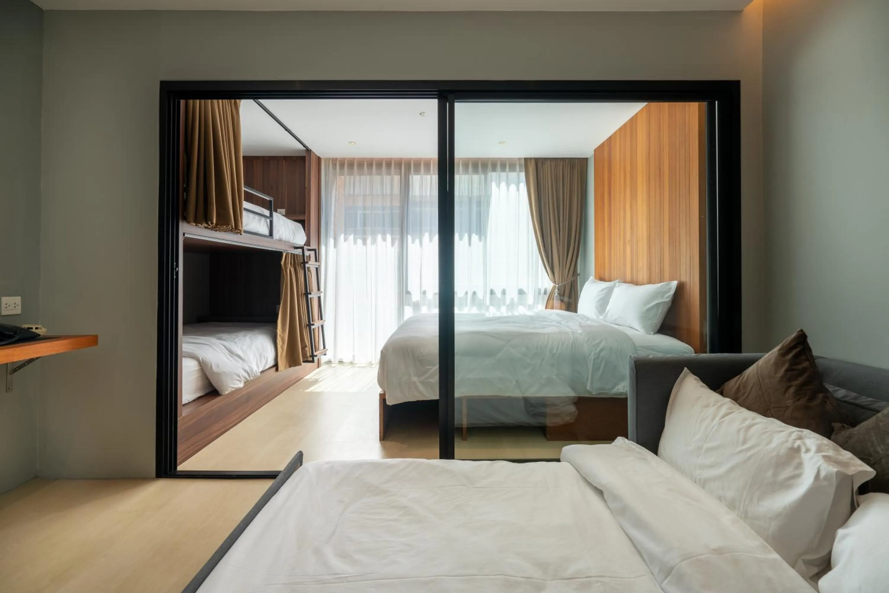 Bed in Woodstory Boutique Hotel