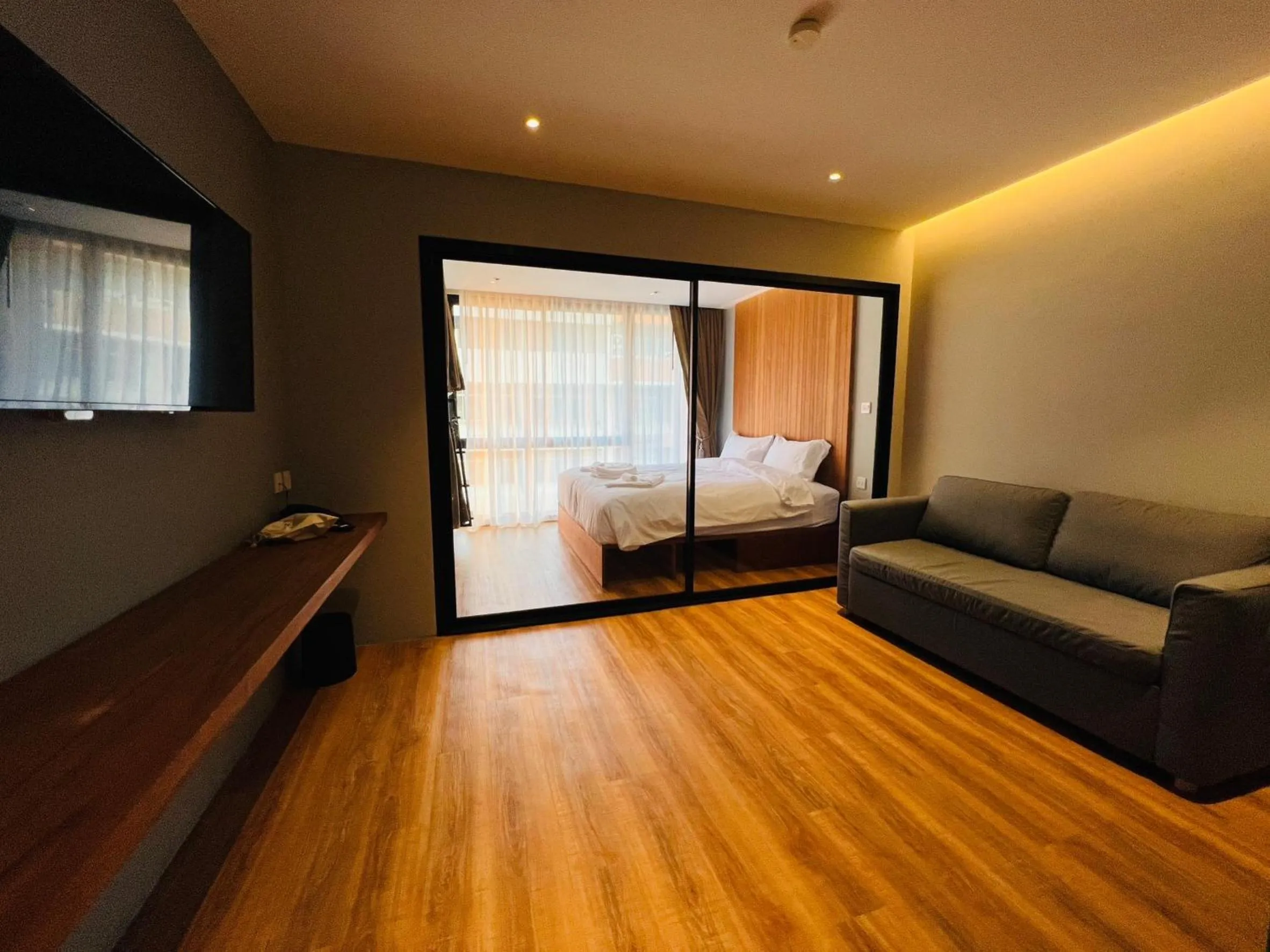 Bed in Woodstory Boutique Hotel