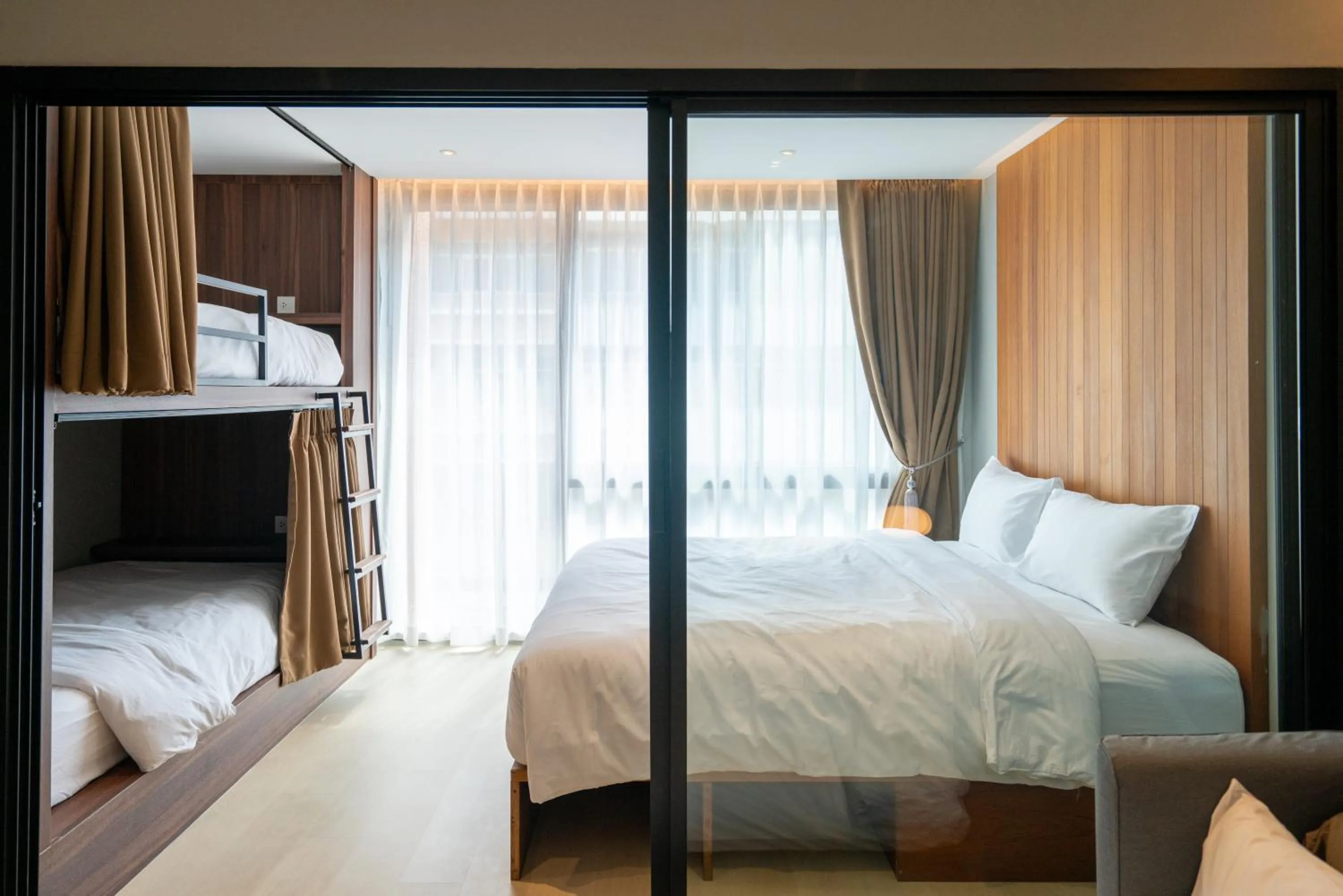 Bed in Woodstory Boutique Hotel