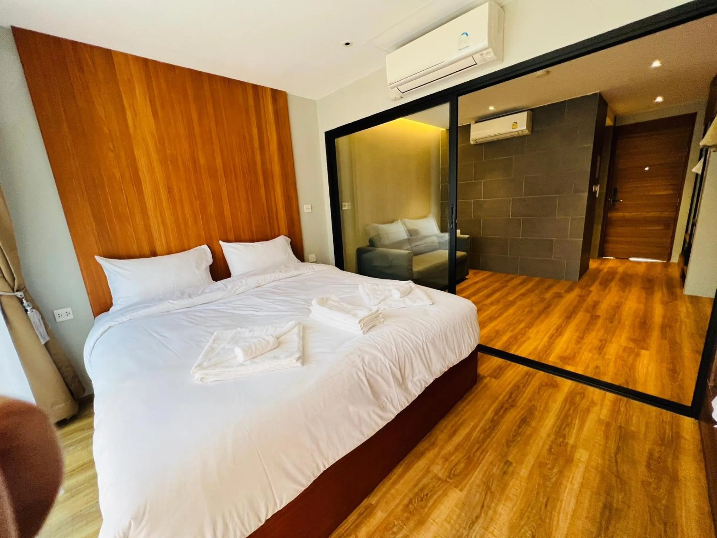 Bed in Woodstory Boutique Hotel