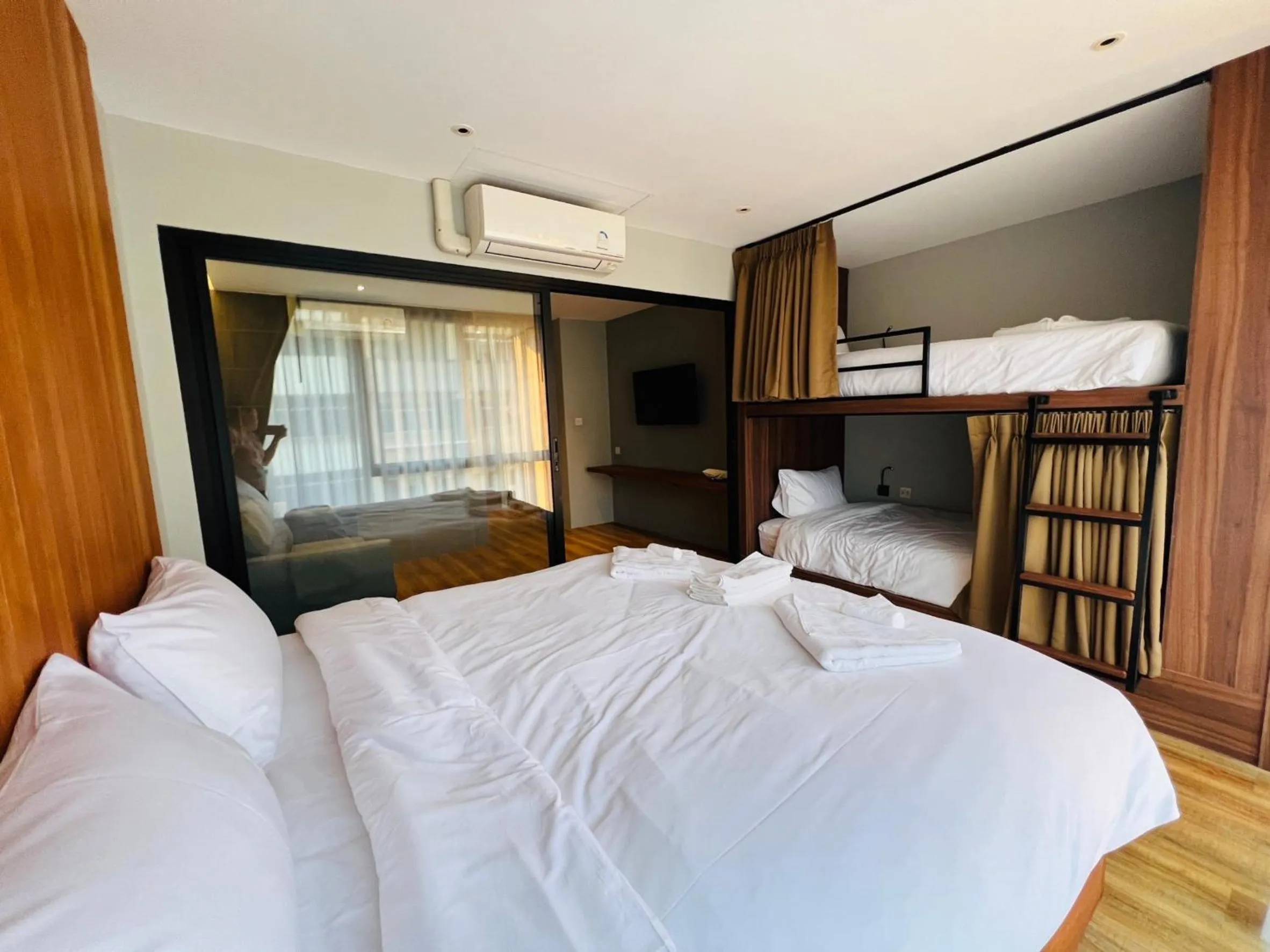 Bed in Woodstory Boutique Hotel