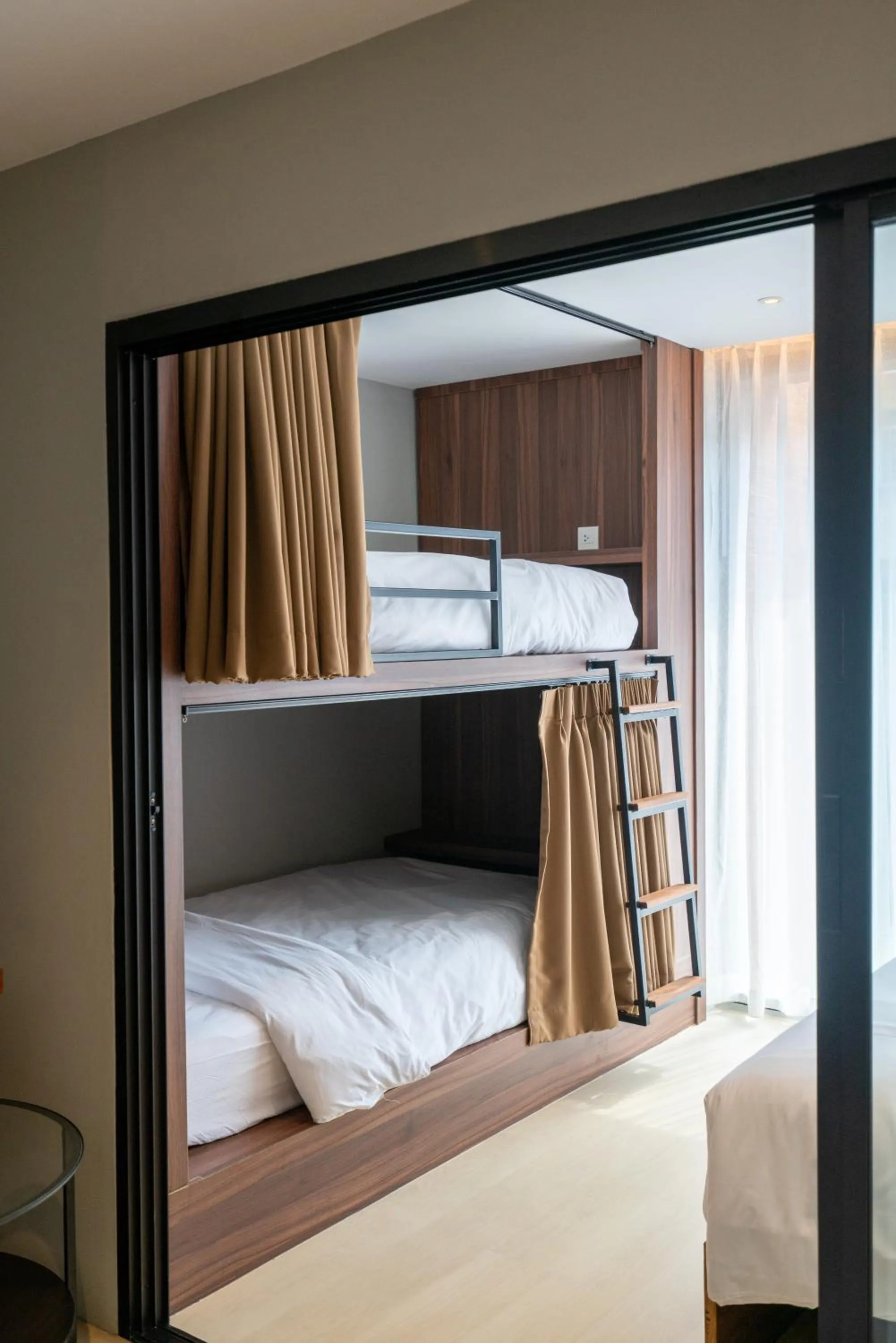 Bed in Woodstory Boutique Hotel