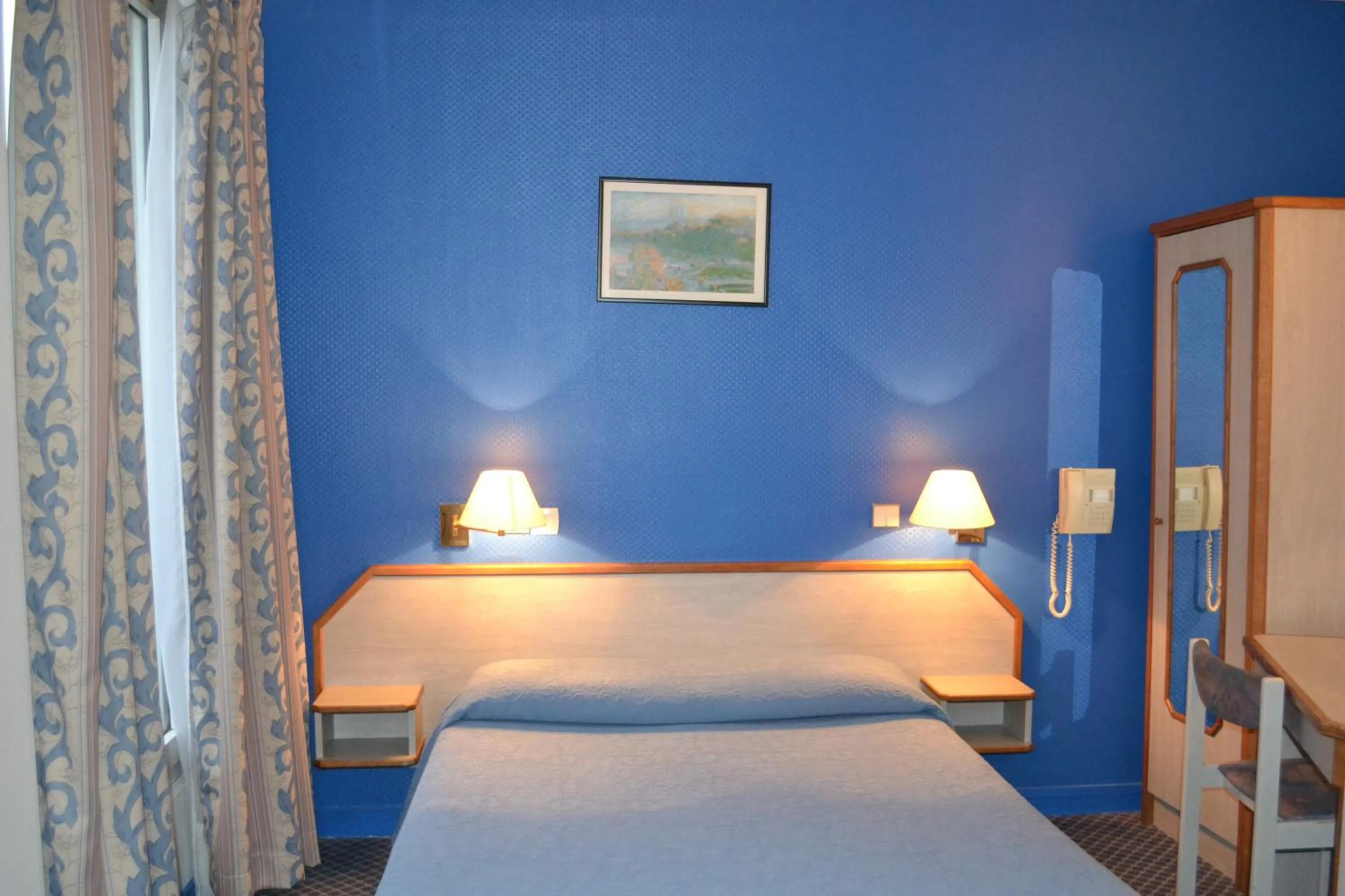 Bed in Hotel William's Opera