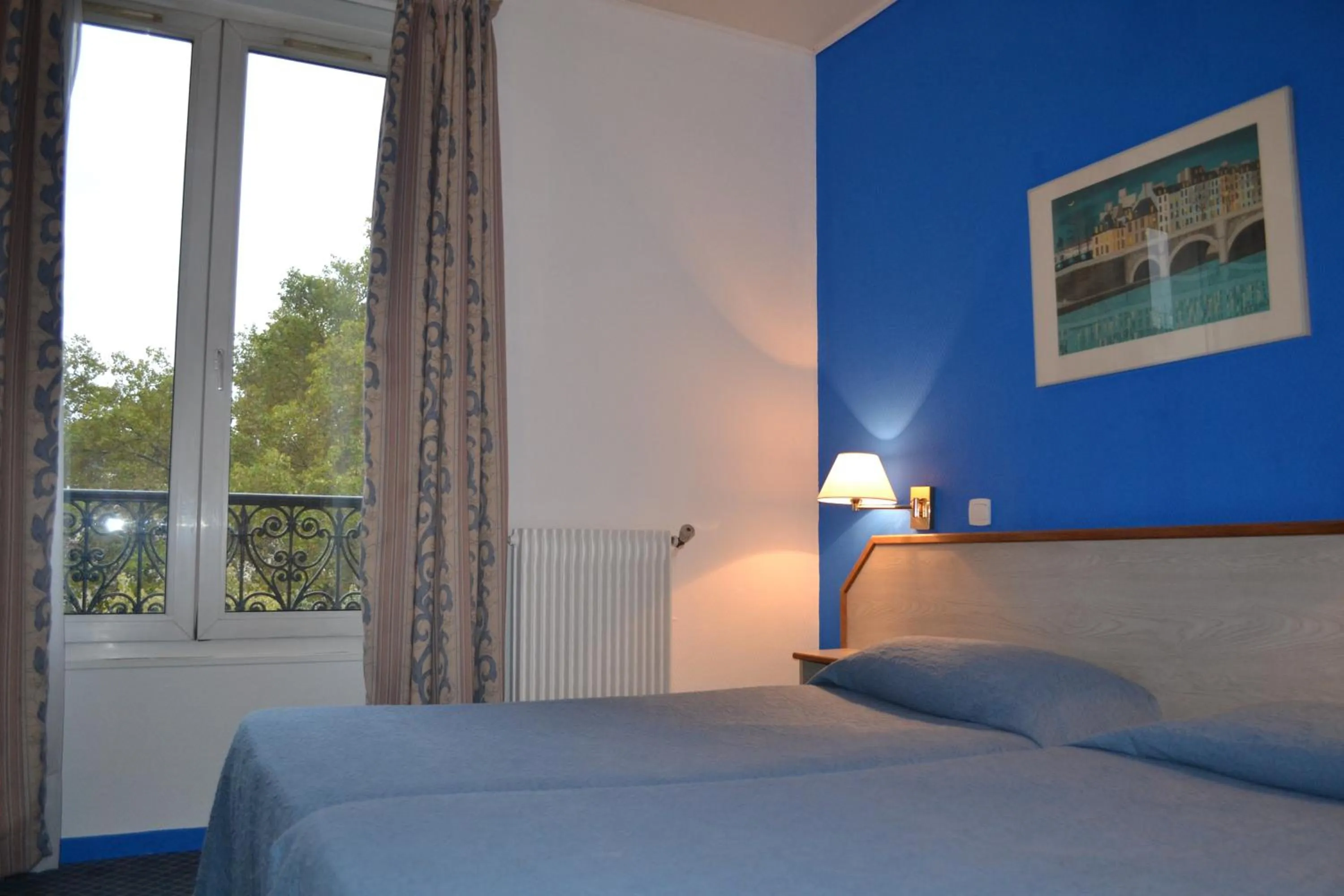 Bed in Hotel William's Opera