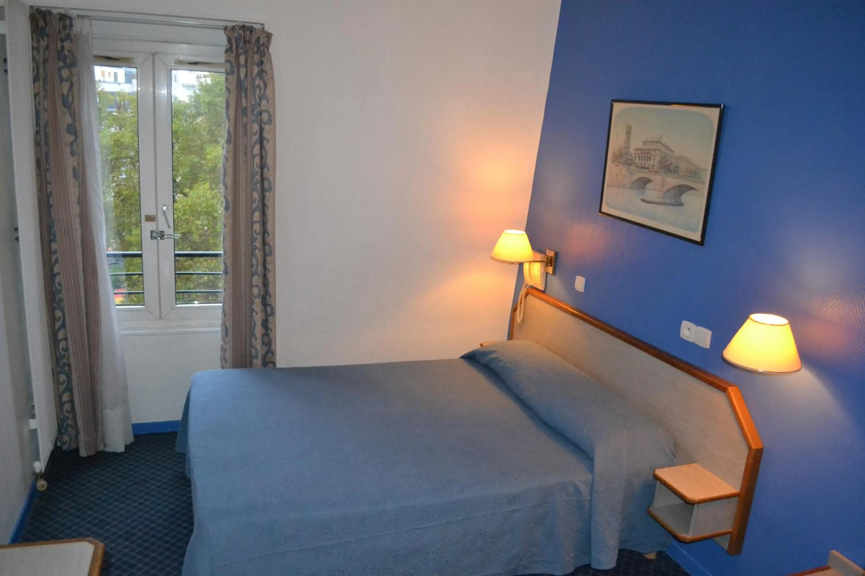 Bed in Hotel William's Opera