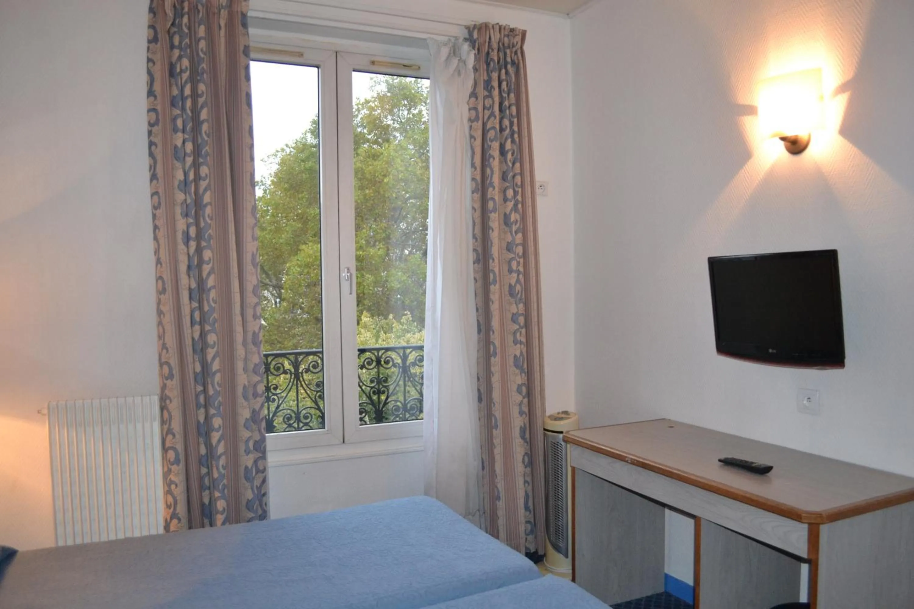 Bed in Hotel William's Opera