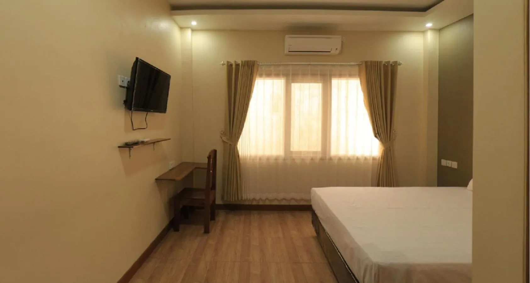 Photo of the whole room, Bed in Bluefire Homestay Syariah