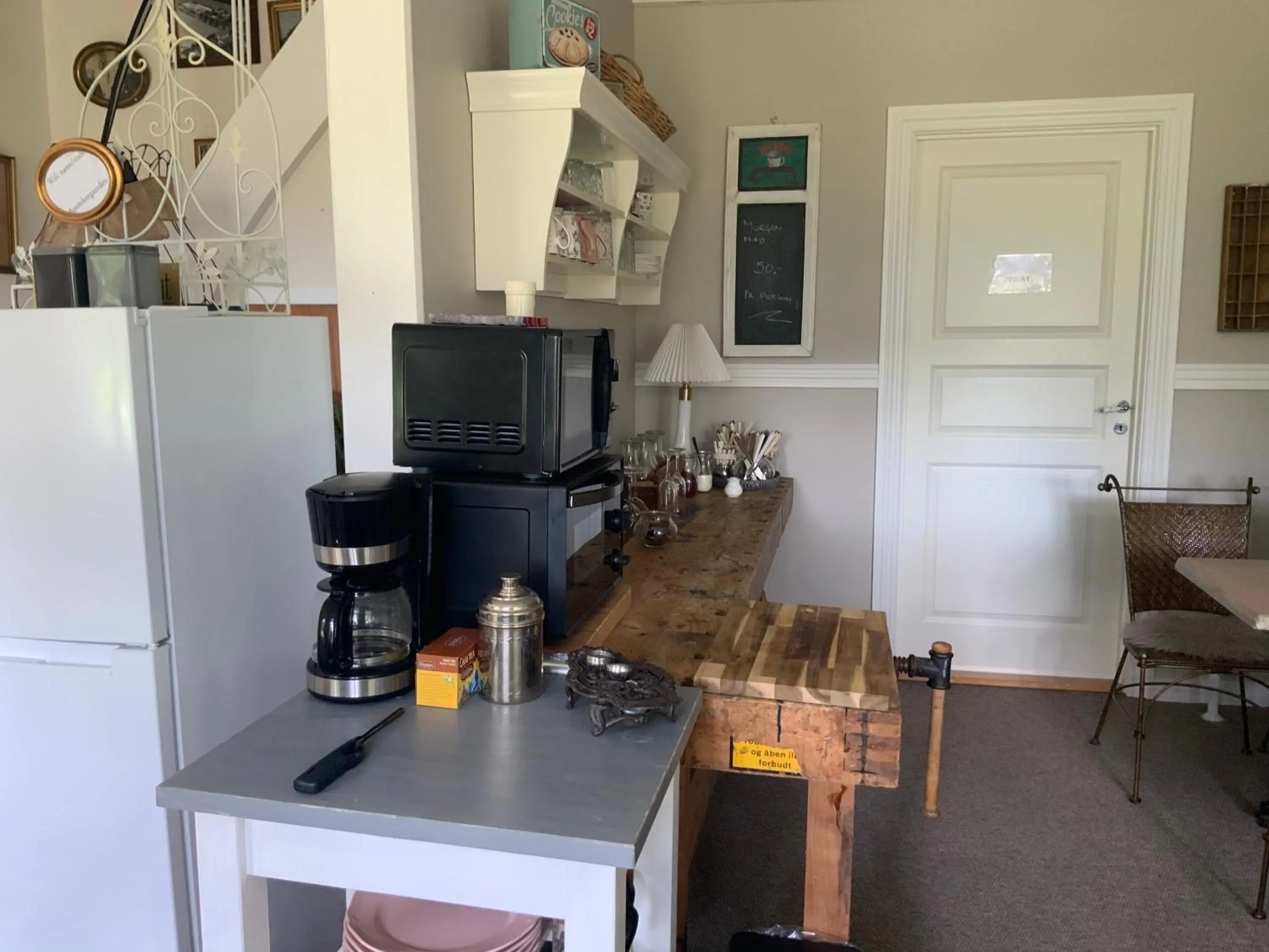 Communal lounge/ TV room in Den Gamle Apotekergaard