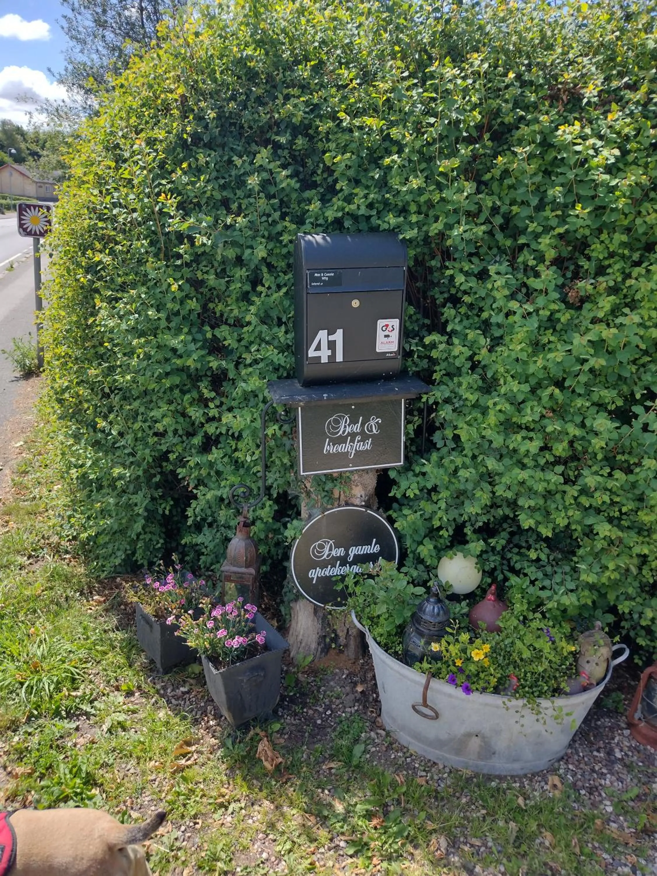 Property logo or sign in Den Gamle Apotekergaard