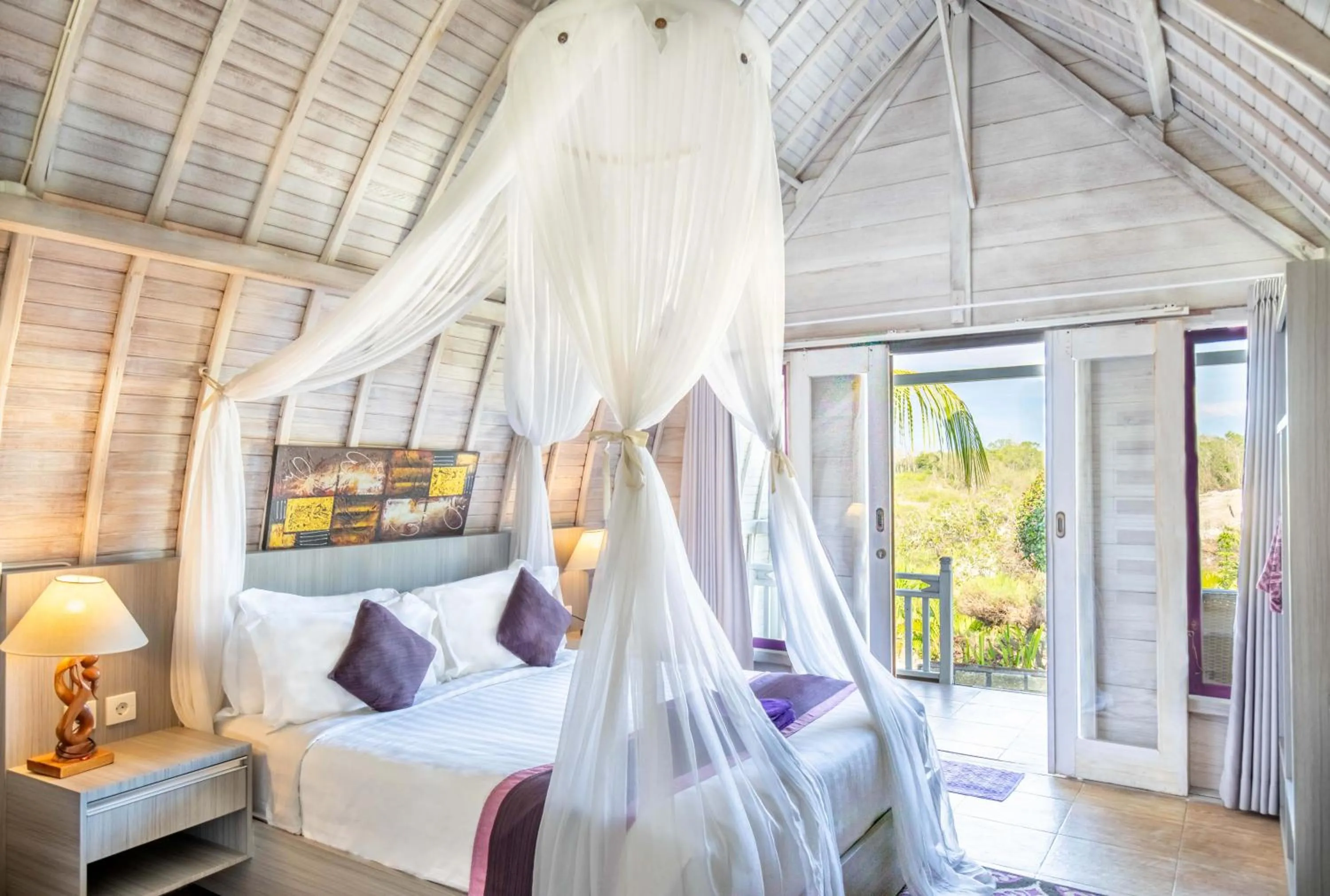 Bed in Akusara Jungle Resort And Spa