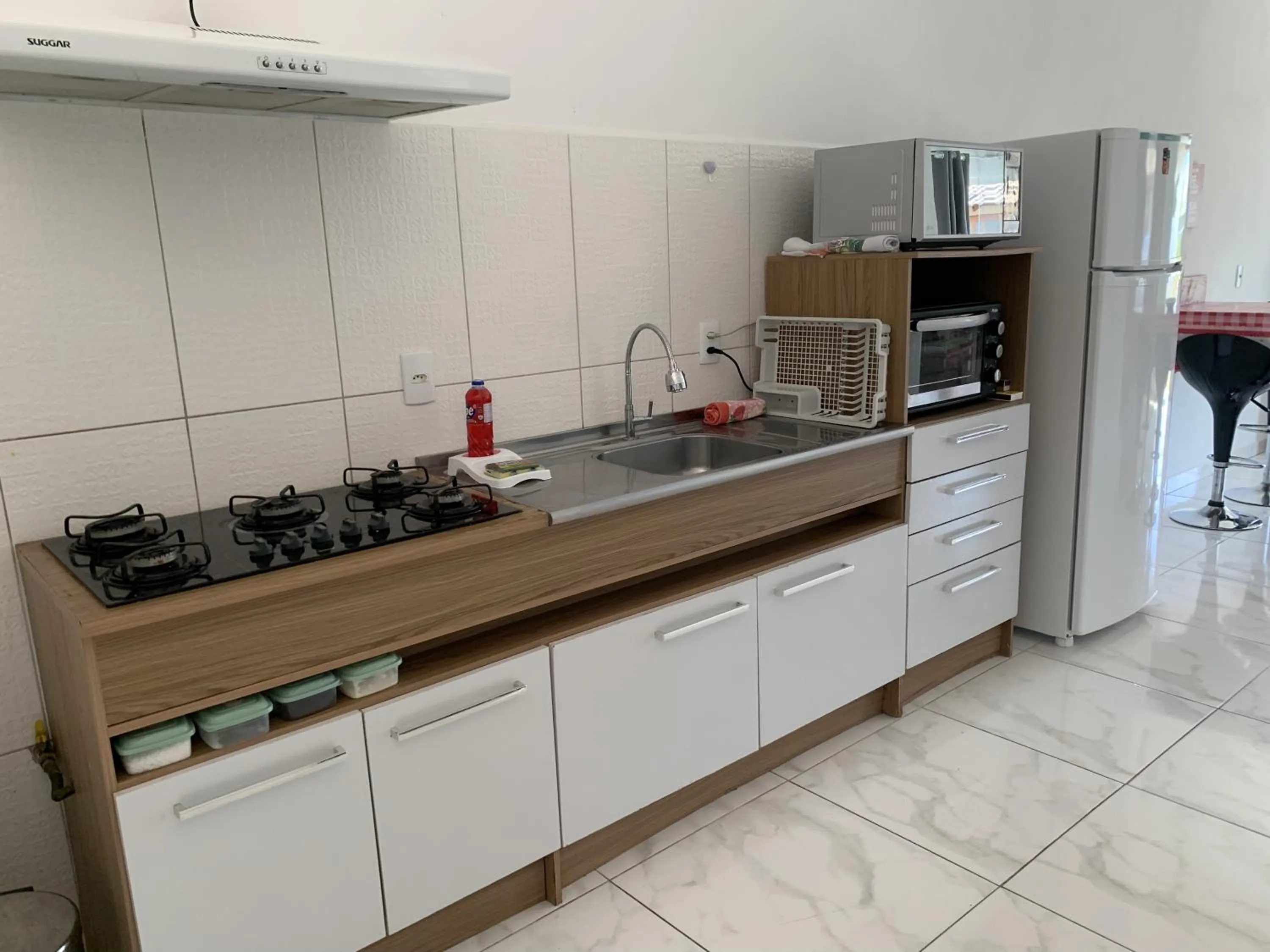 Kitchen or kitchenette in Casa do Lago - Condomínio de Casas para aluguel diário e de Temporada