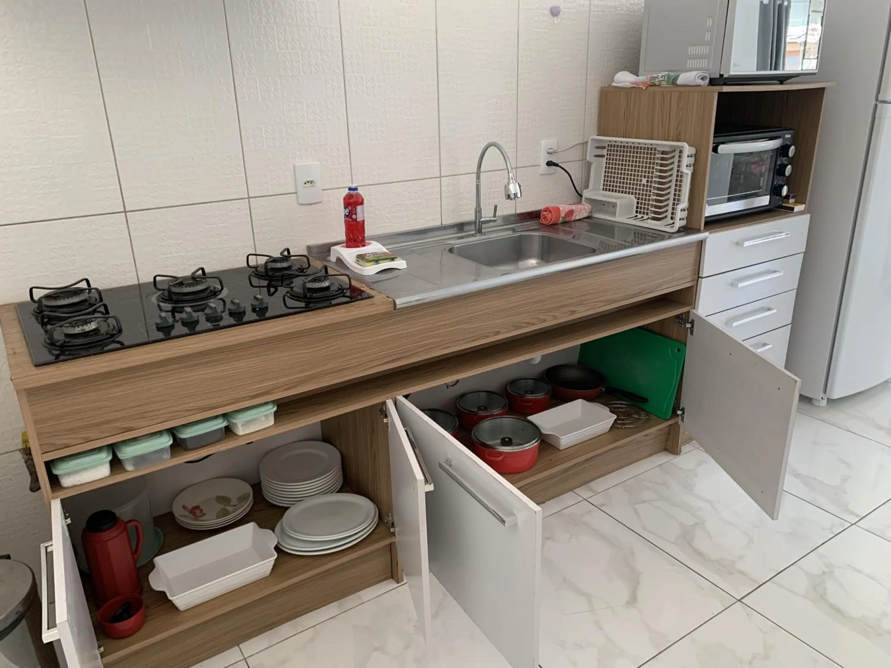 Kitchen or kitchenette in Casa do Lago - Condomínio de Casas para aluguel diário e de Temporada