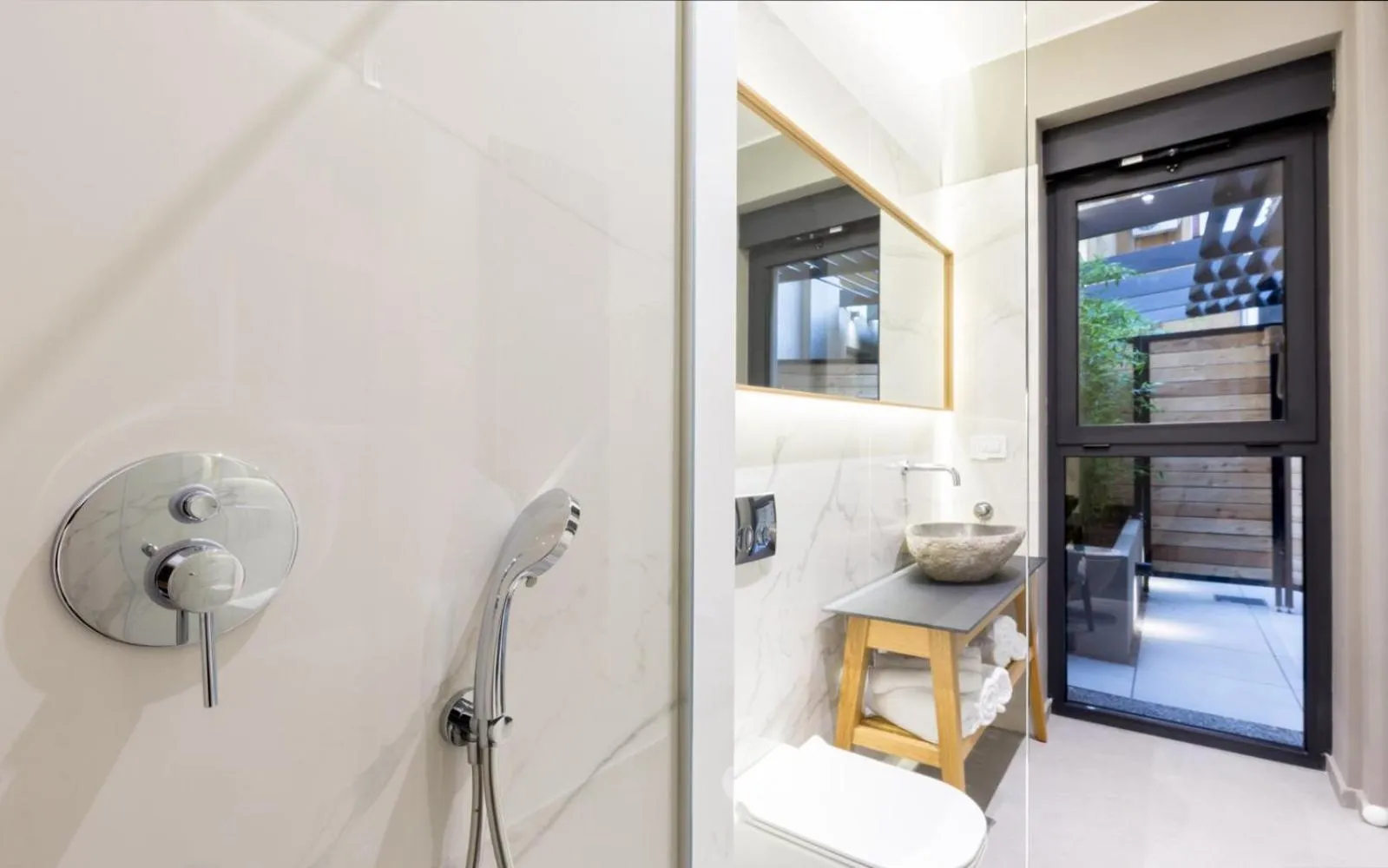 Bathroom in Teanna Lux Apartments