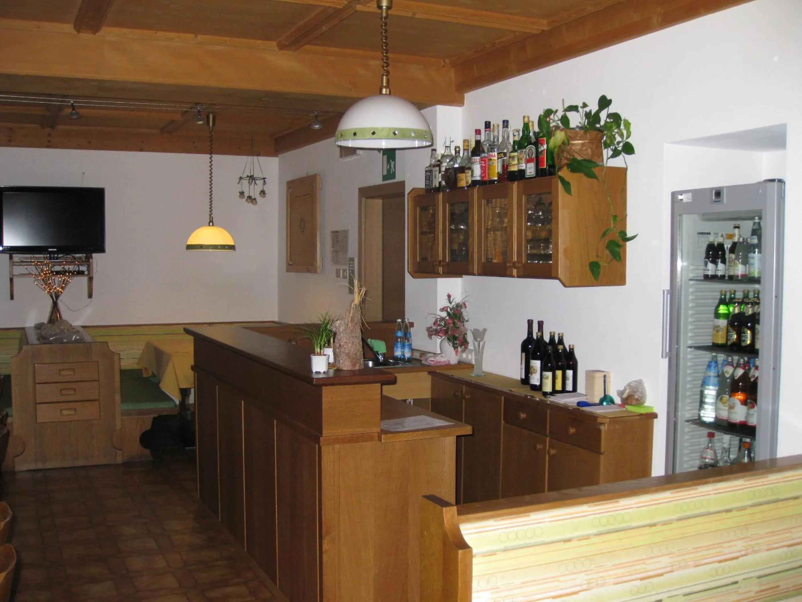 Communal lounge/ TV room in Garni Apparthotel St Valentin